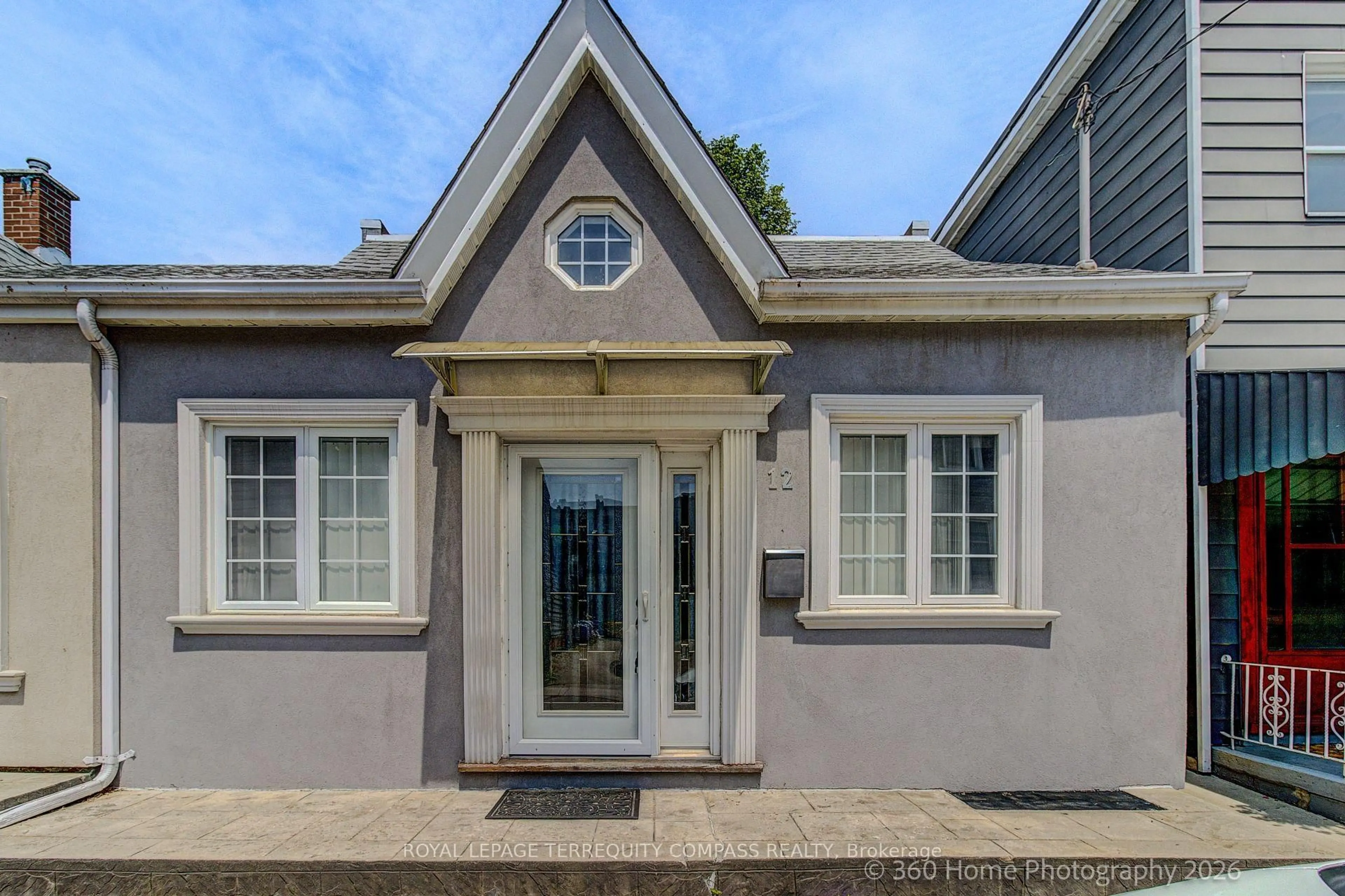 Home with vinyl exterior material, street for 12 Abbs St, Toronto Ontario M6K 1M6
