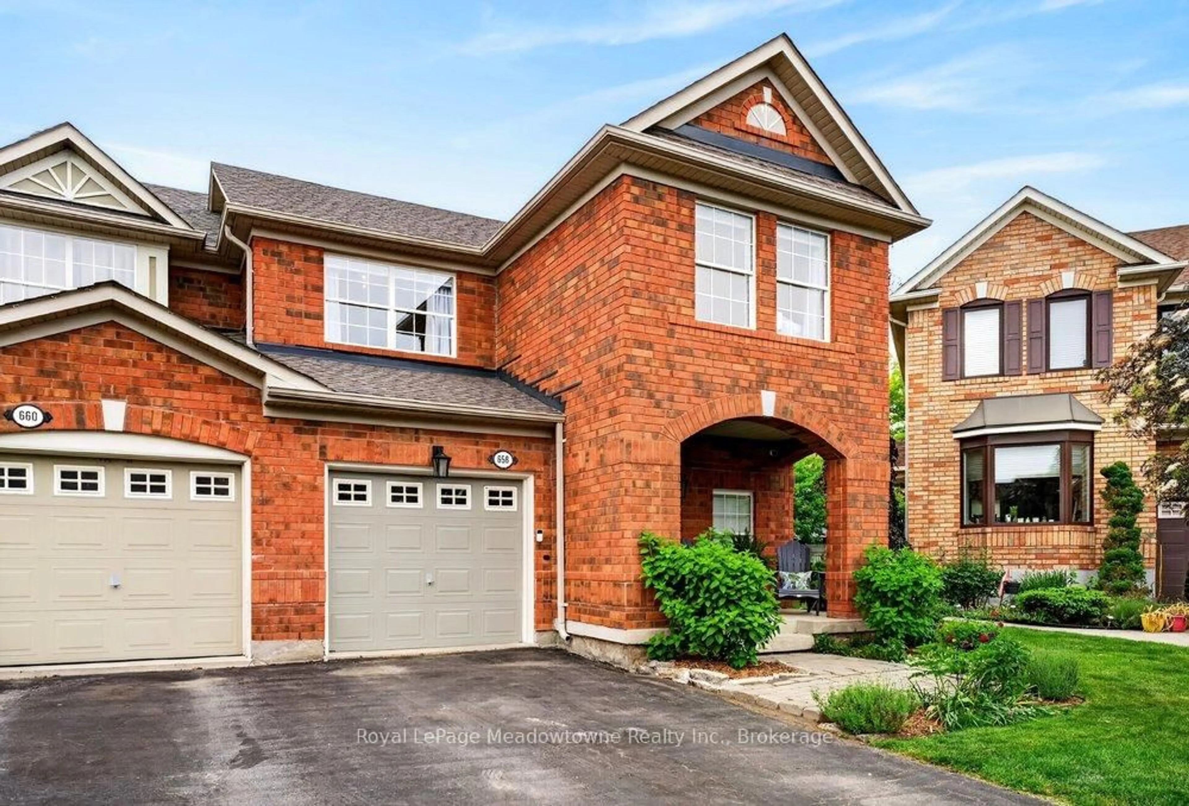 Home with brick exterior material, street for 658 Porter Way, Milton Ontario L9T 5W2