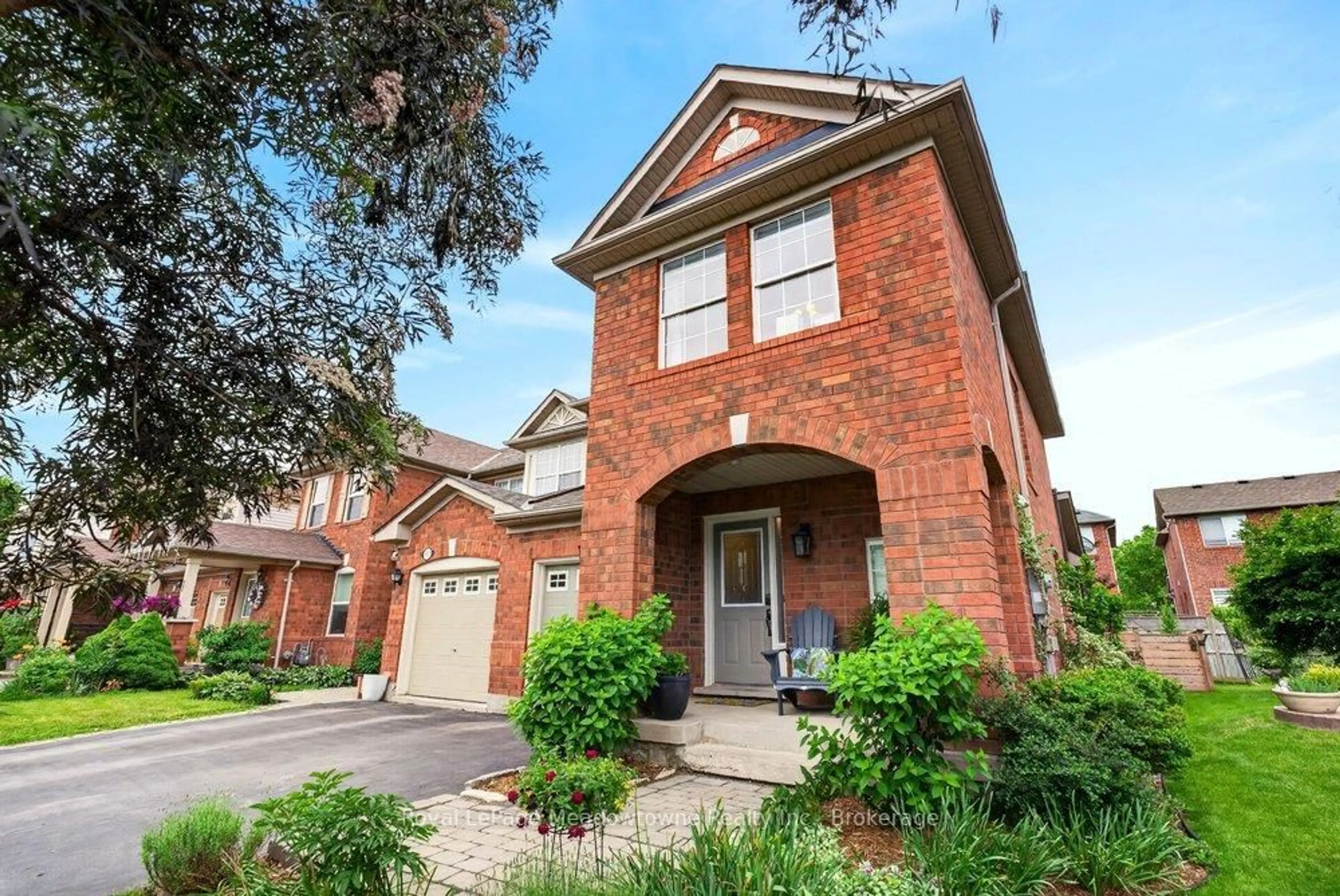 Home with brick exterior material, street for 658 Porter Way, Milton Ontario L9T 5W2