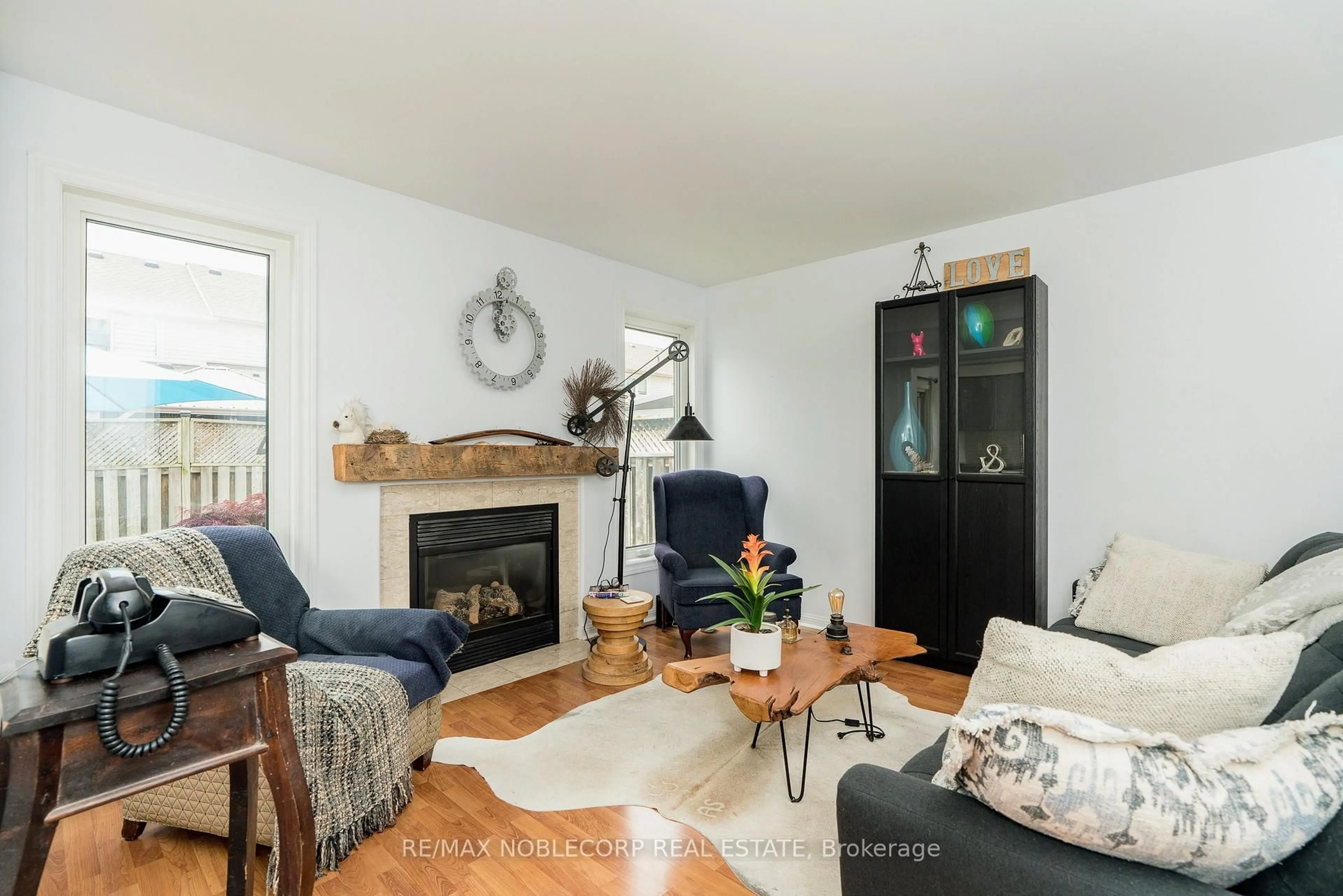 Living room with furniture, wood/laminate floor for 747 Edwards Ave, Milton Ontario L9T 6B2