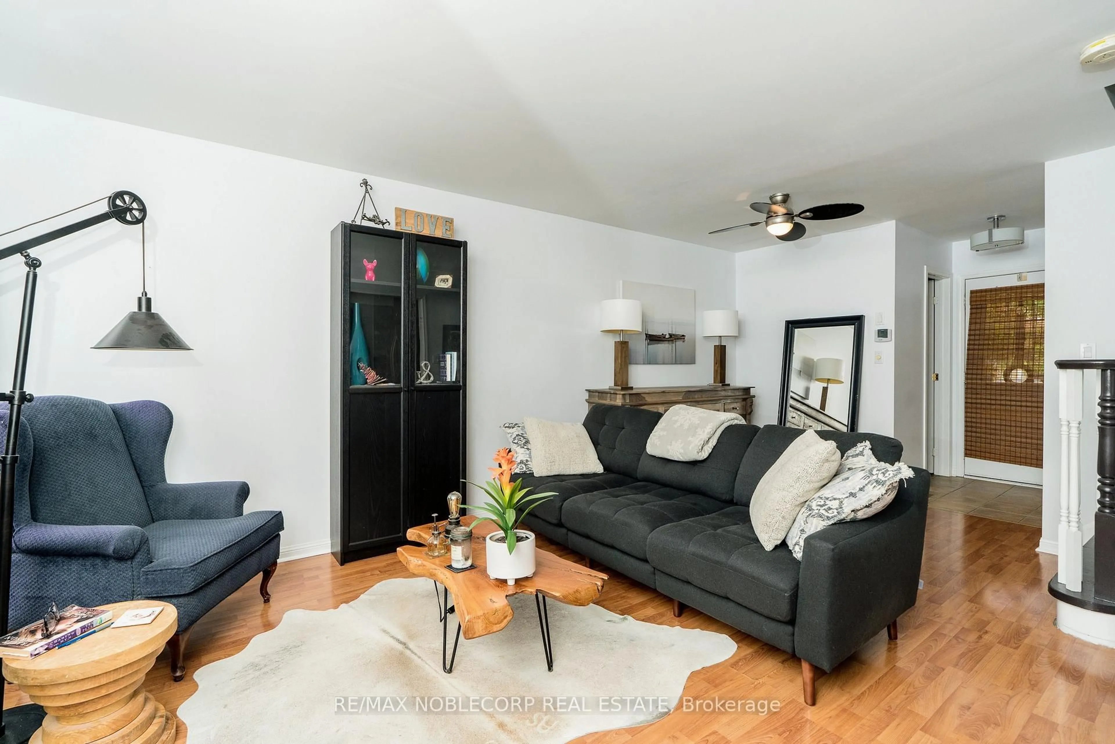 Living room with furniture, wood/laminate floor for 747 Edwards Ave, Milton Ontario L9T 6B2