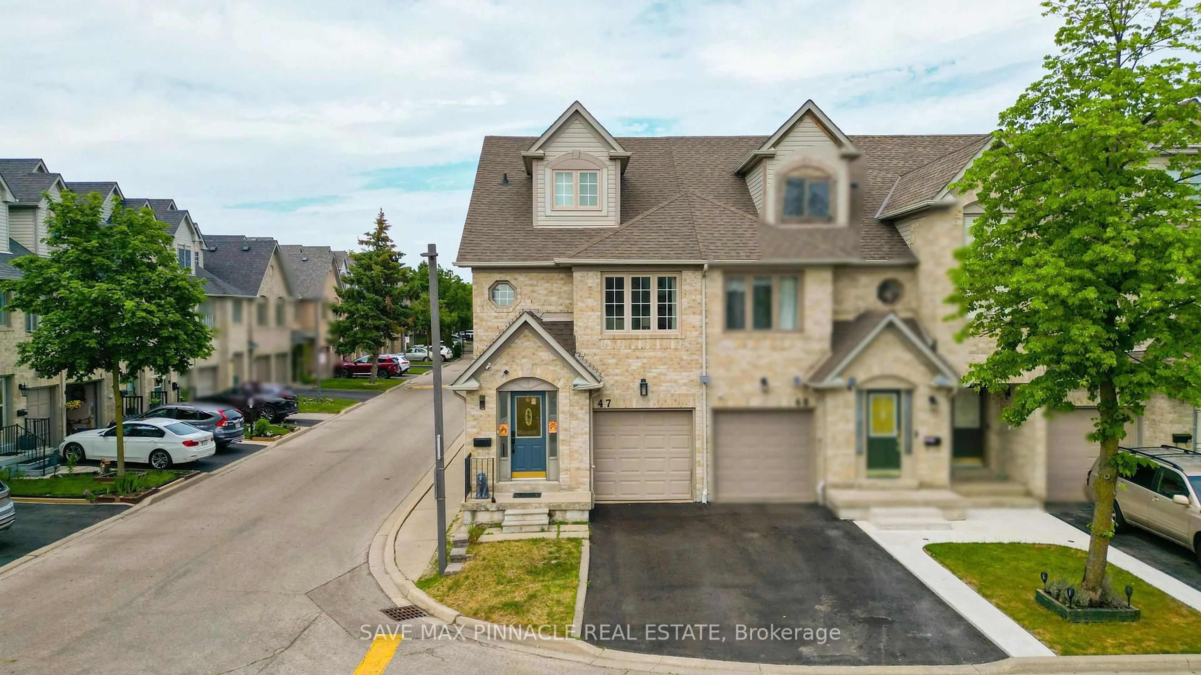 A pic from outside/outdoor area/front of a property/back of a property/a pic from drone, street for 1292 Sherwood Mills Blvd #47, Mississauga Ontario L5V 2G8