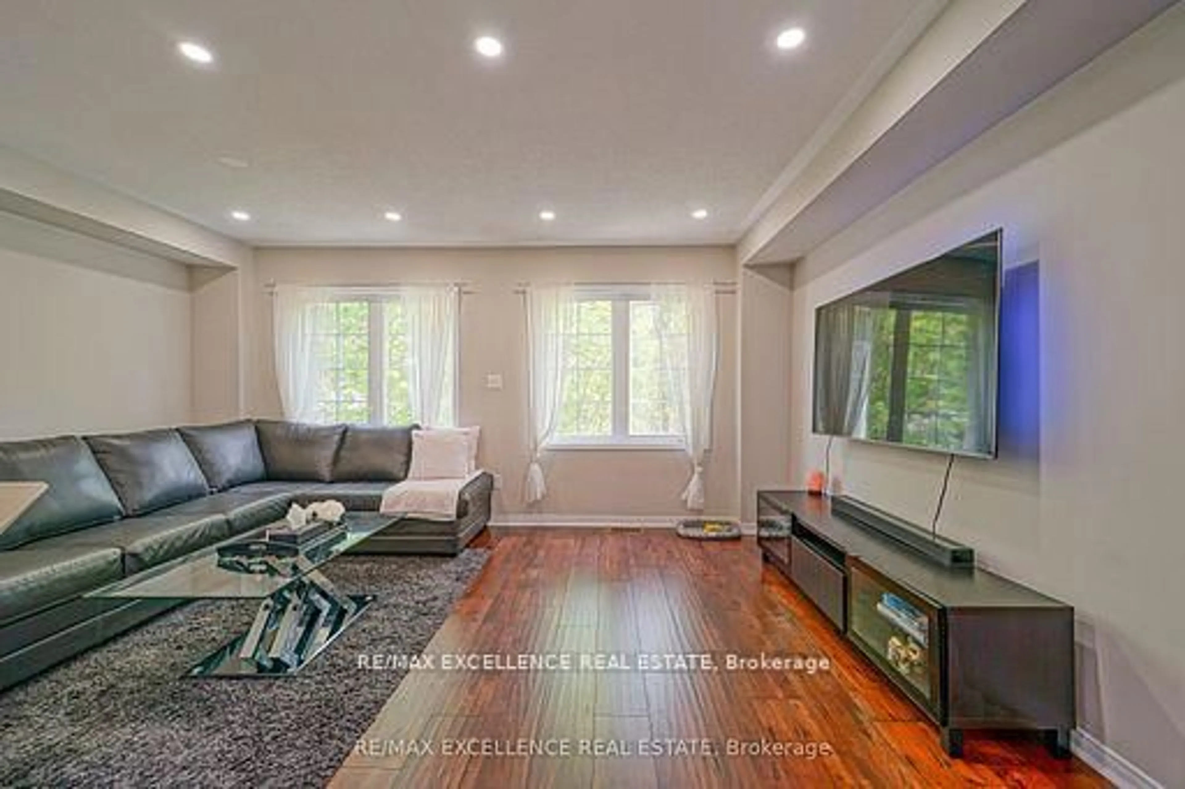 Living room with furniture, wood/laminate floor for 3950 Erin Centre Blvd #66, Mississauga Ontario L5M 0A5