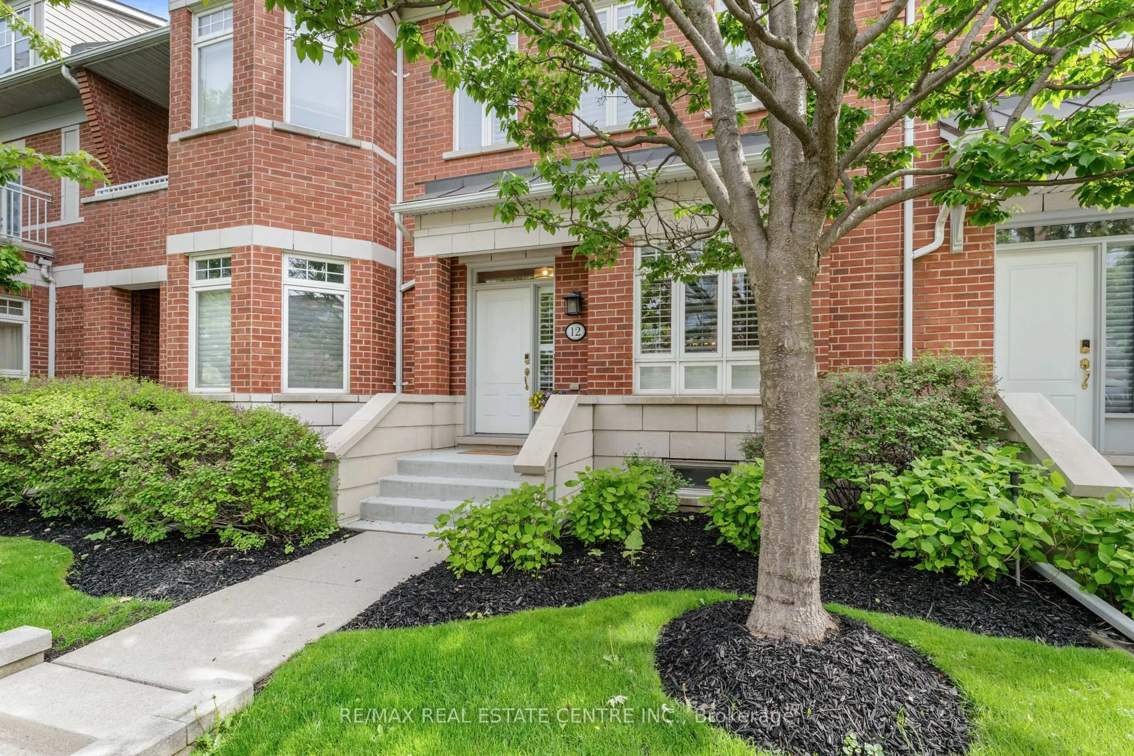 Home with brick exterior material, street for 12 St Lawrence Dr, Mississauga Ontario L5G 4V1