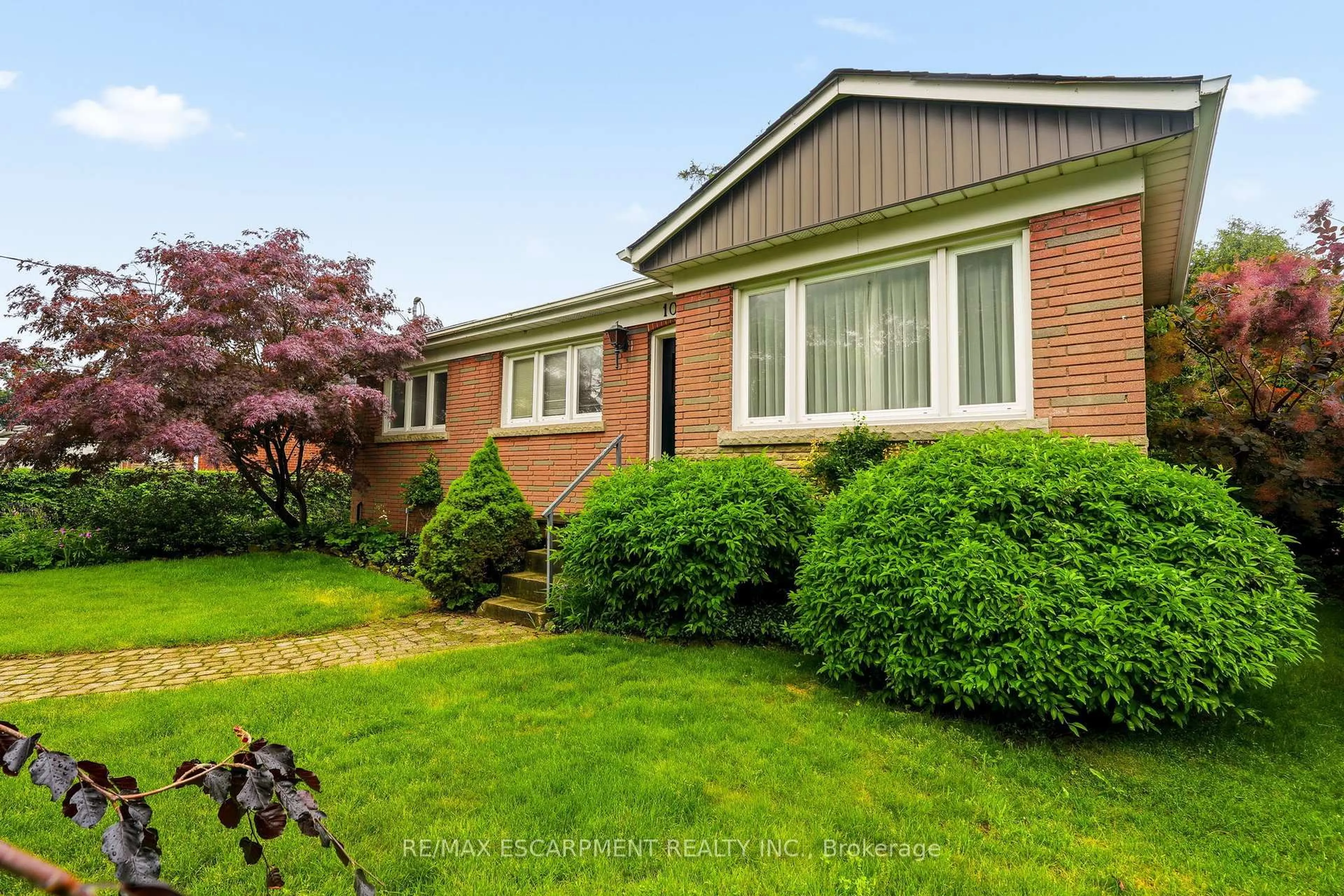 Home with brick exterior material, street for 1059 SHEPHERDS Dr, Burlington Ontario L7T 3R4