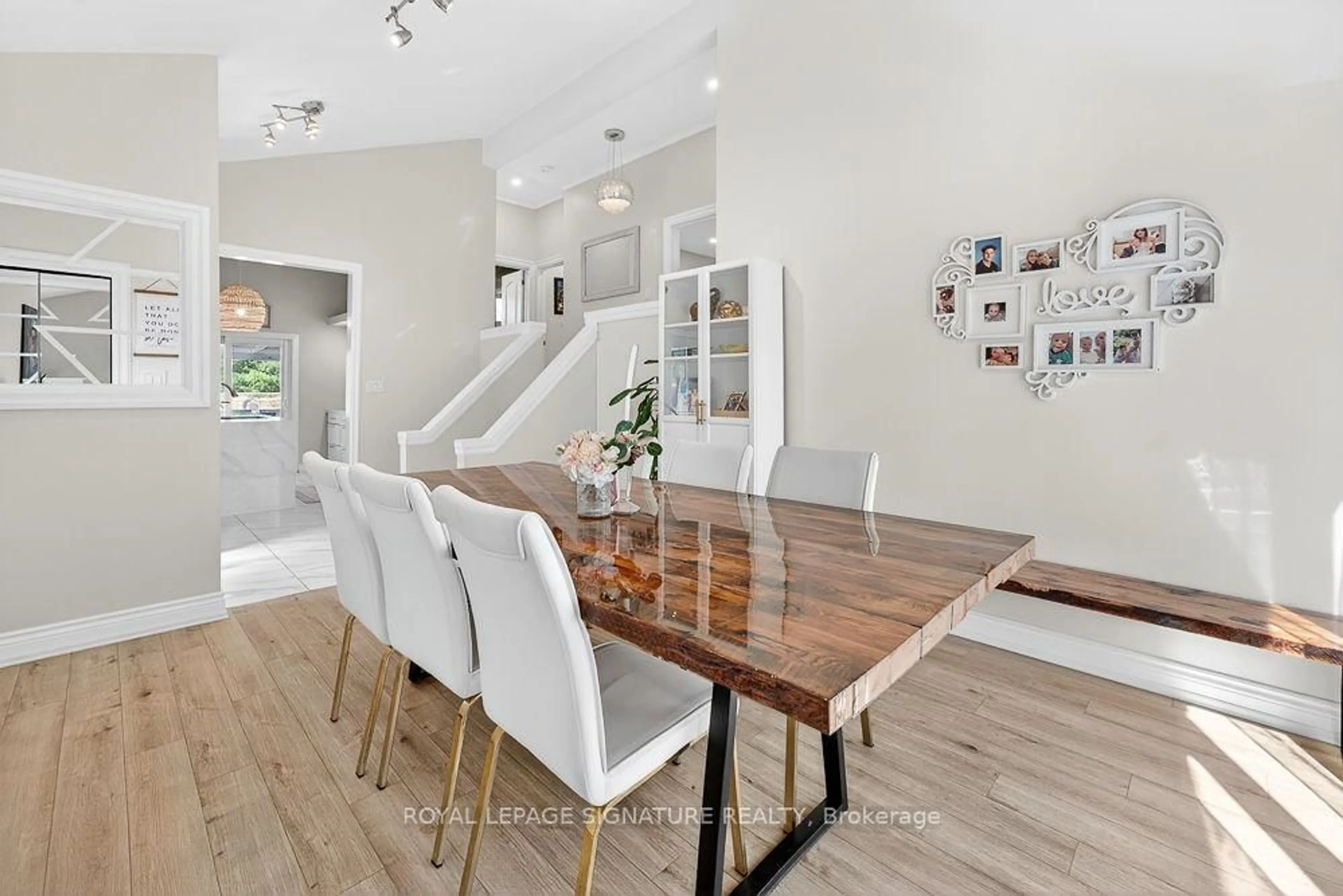 Dining room, wood/laminate floor for 1311 Lewisham Dr, Mississauga Ontario L5J 3P8