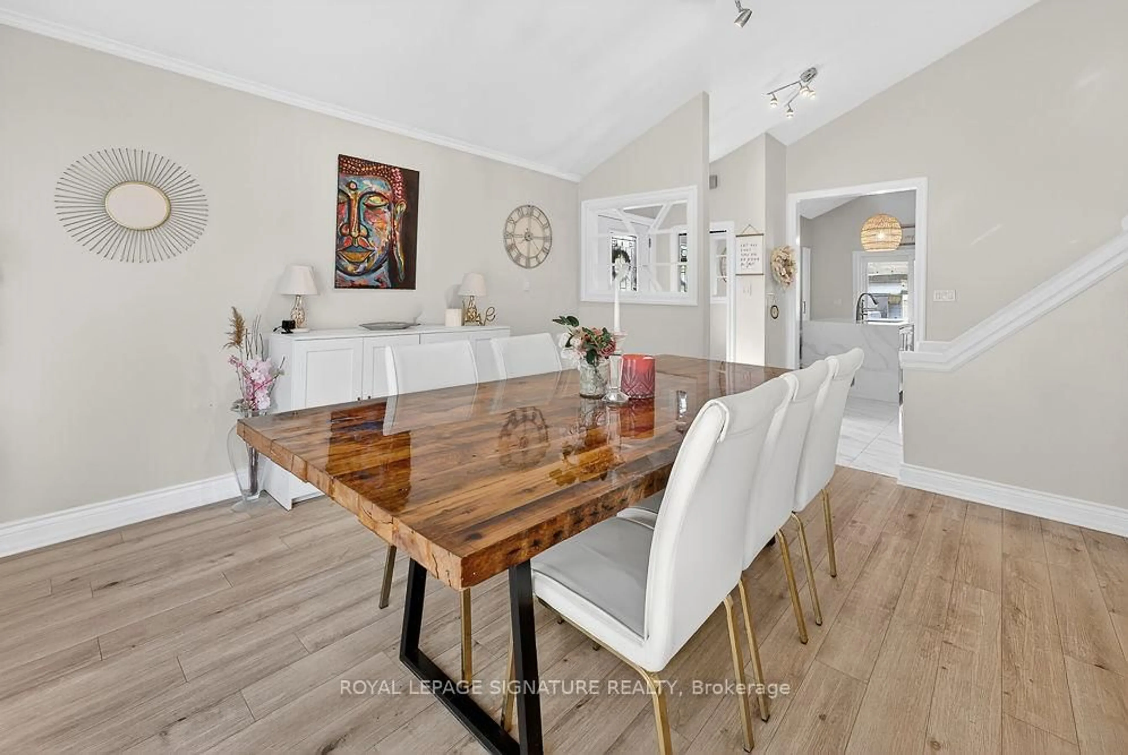 Dining room, wood/laminate floor for 1311 Lewisham Dr, Mississauga Ontario L5J 3P8