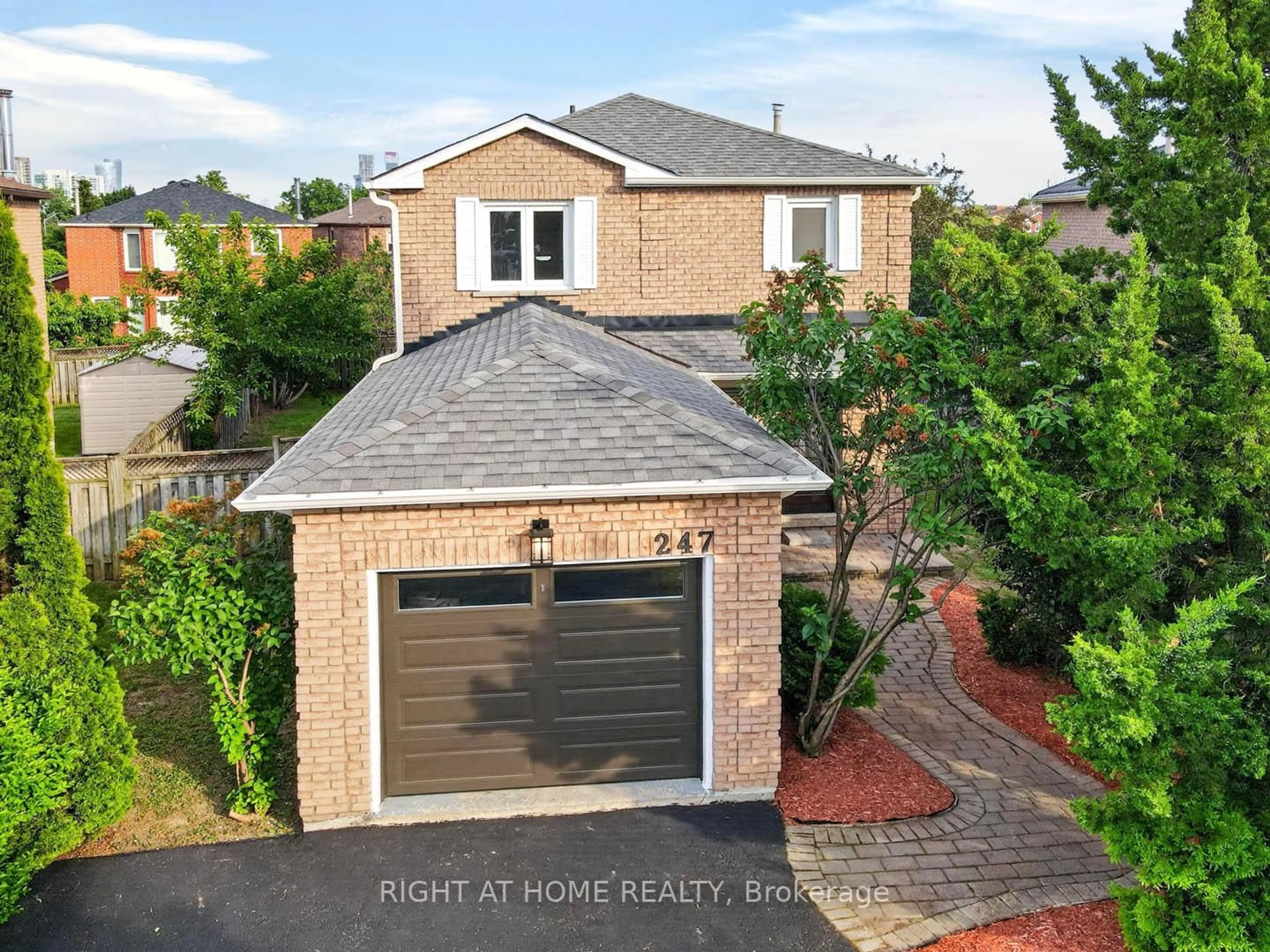 A pic from outside/outdoor area/front of a property/back of a property/a pic from drone, street for 247 Glenn Hawthorne Blvd, Mississauga Ontario L5R 2M5