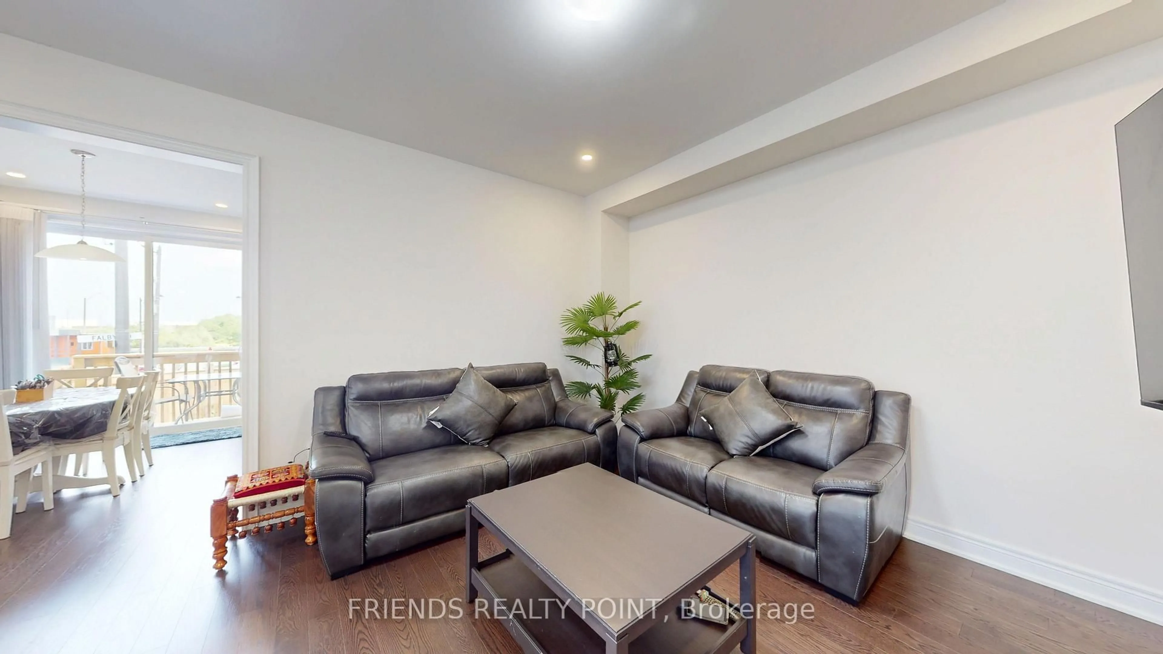 Living room with furniture, wood/laminate floor for 9 Falby Rd, Brampton Ontario L6P 4S1