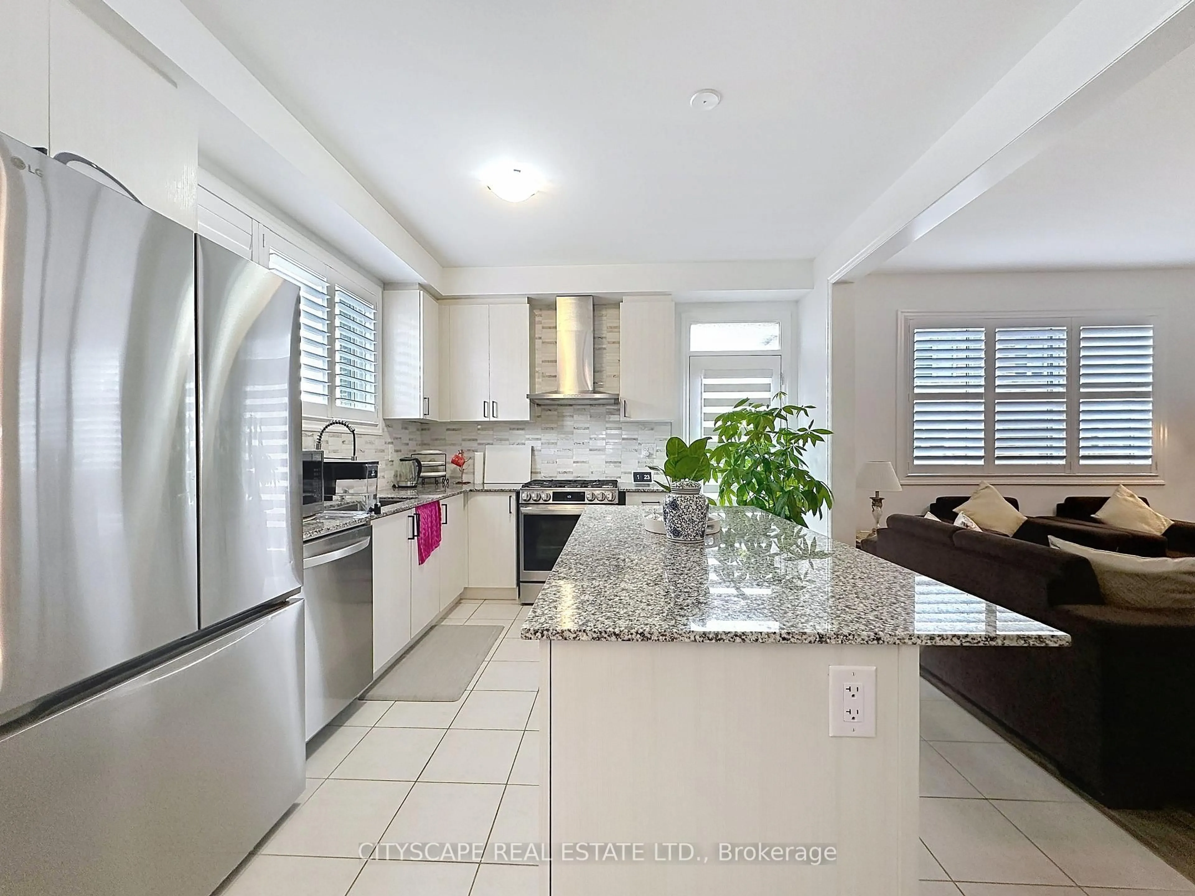 Open concept kitchen, ceramic/tile floor for 1790 Dance Crt, Milton Ontario L9E 2A2