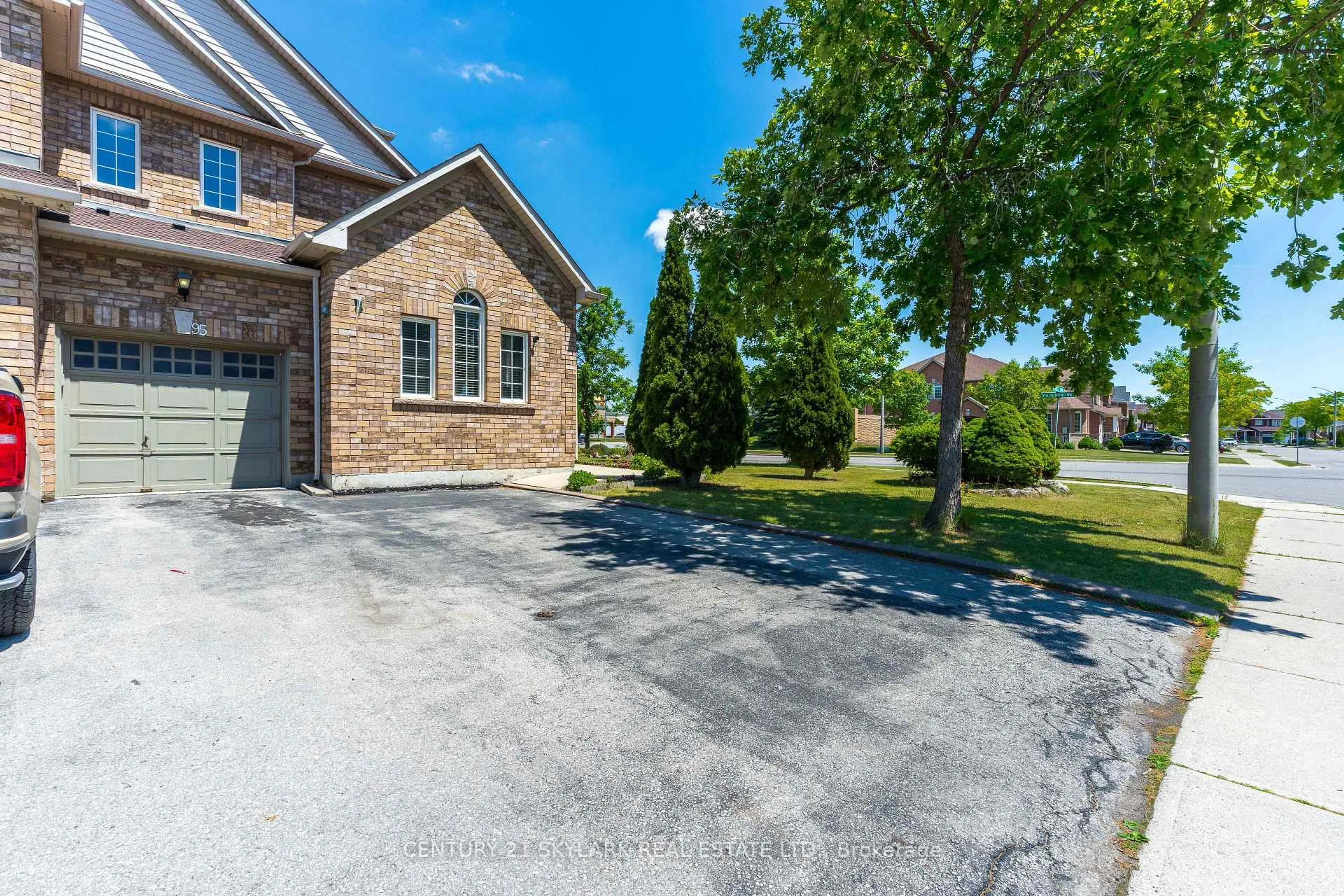 Home with brick exterior material, street for 95 Via Romano Way, Brampton Ontario L6P 1P3