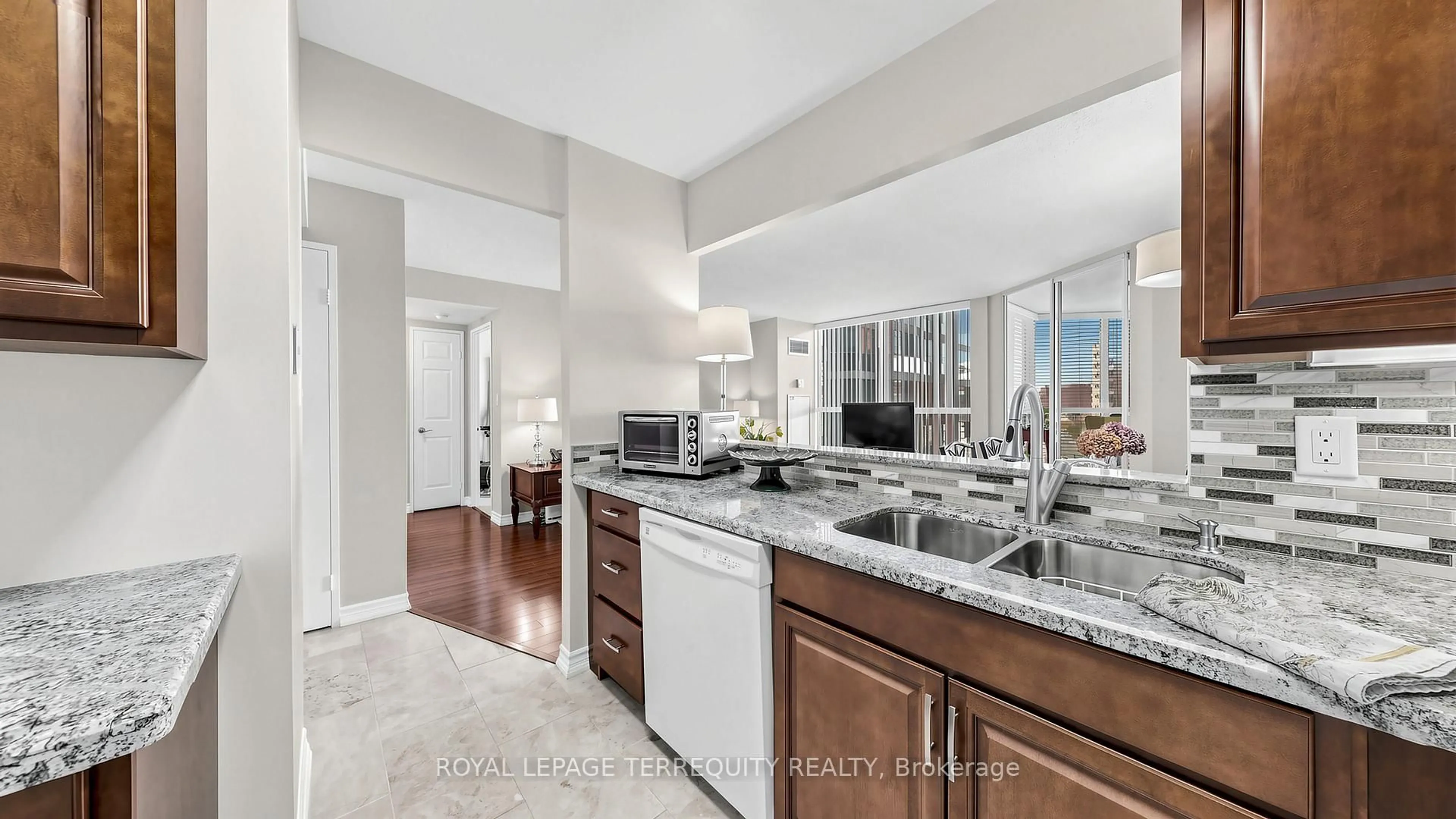 Open concept kitchen, ceramic/tile floor for 22 Southport St #833, Toronto Ontario M6S 4Y9