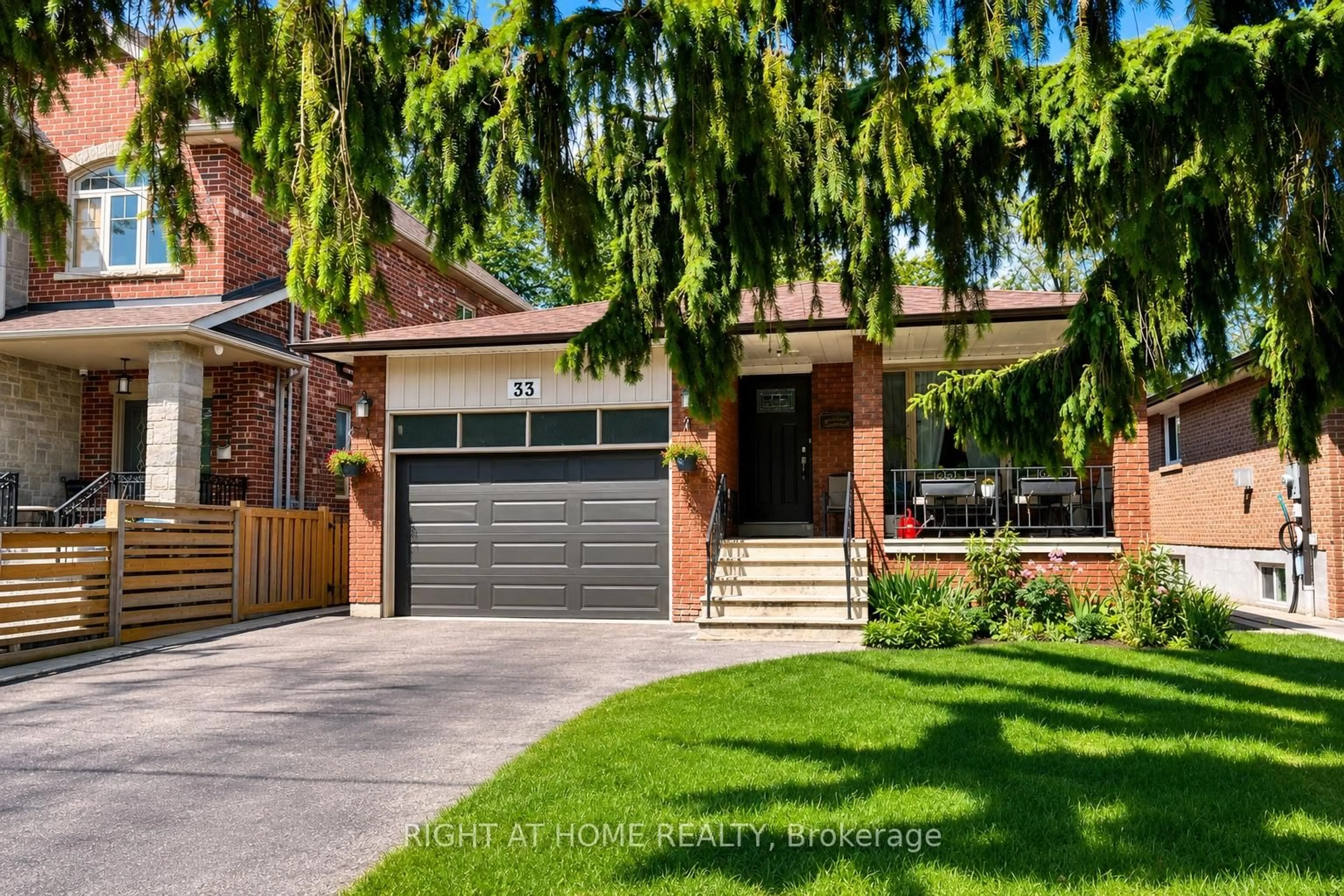 Home with brick exterior material, street for 33 Benson Ave, Mississauga Ontario L5H 2P3