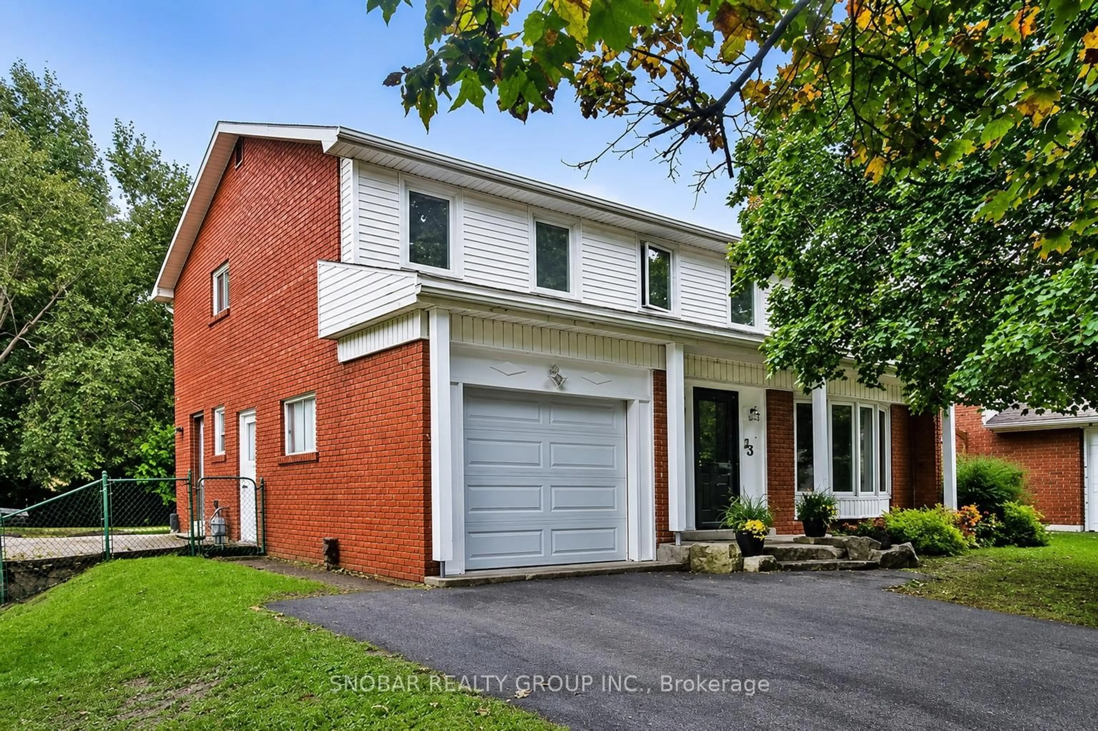 Home with brick exterior material, street for 33 Waterford Dr, Toronto Ontario M9R 2N5