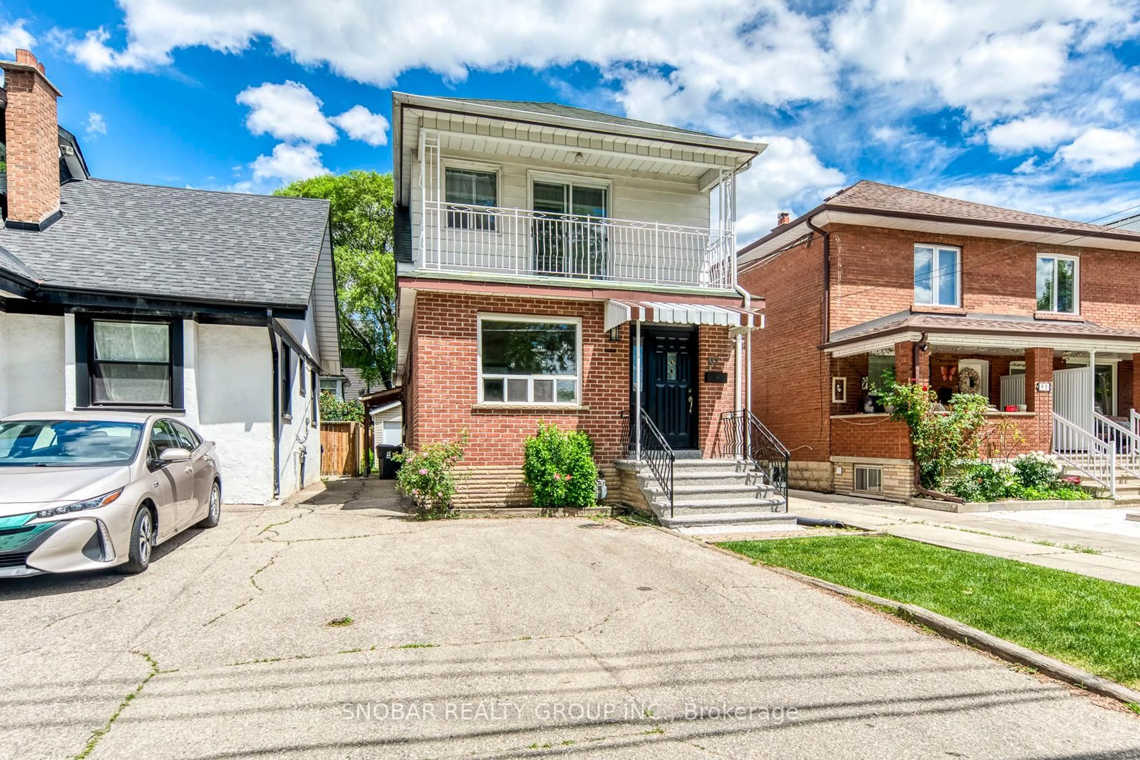 Home with brick exterior material, street for 97 Guestville Ave, Toronto Ontario M6N 4N5