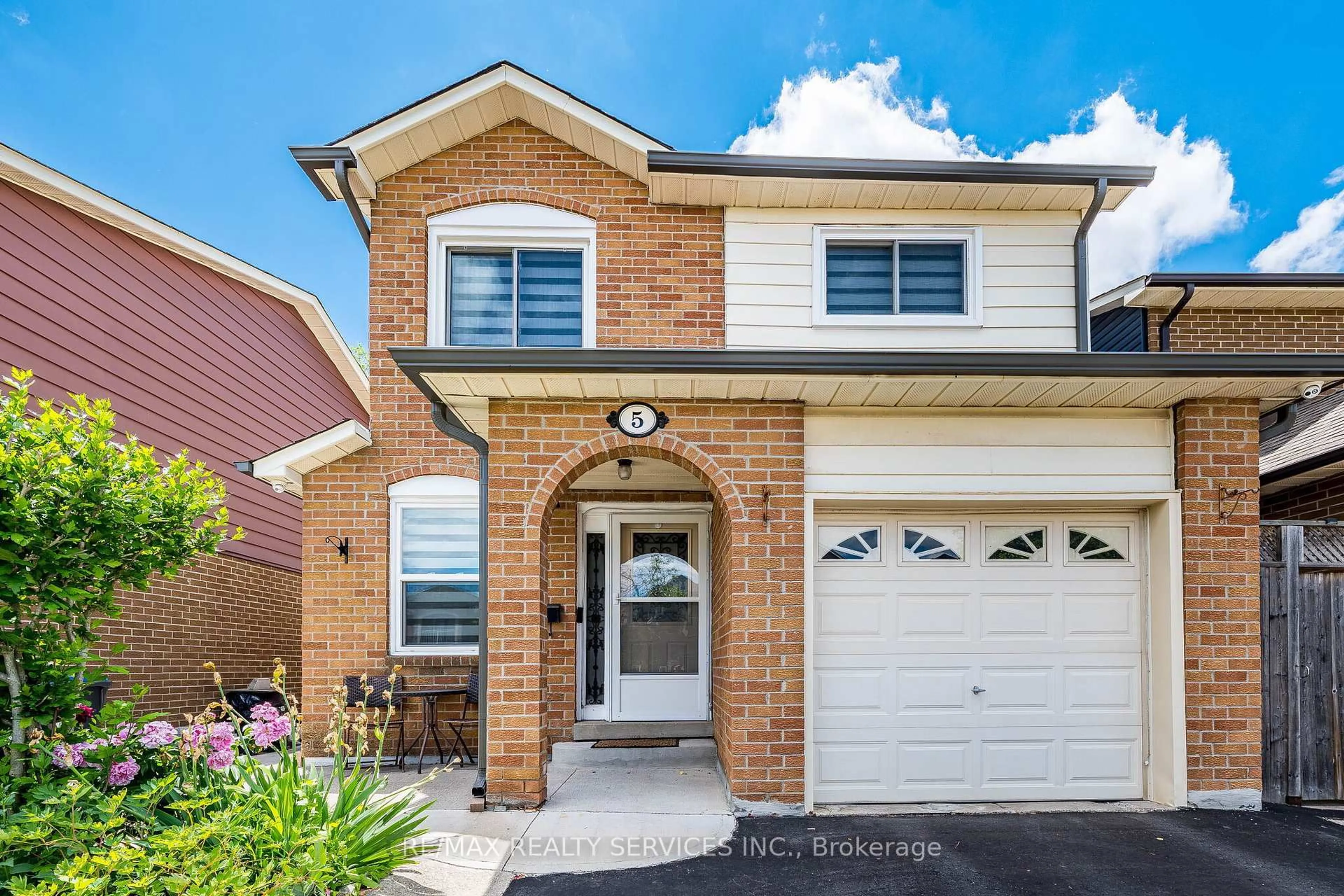 Home with brick exterior material, street for 5 Wikander Way, Brampton Ontario L6V 3X1