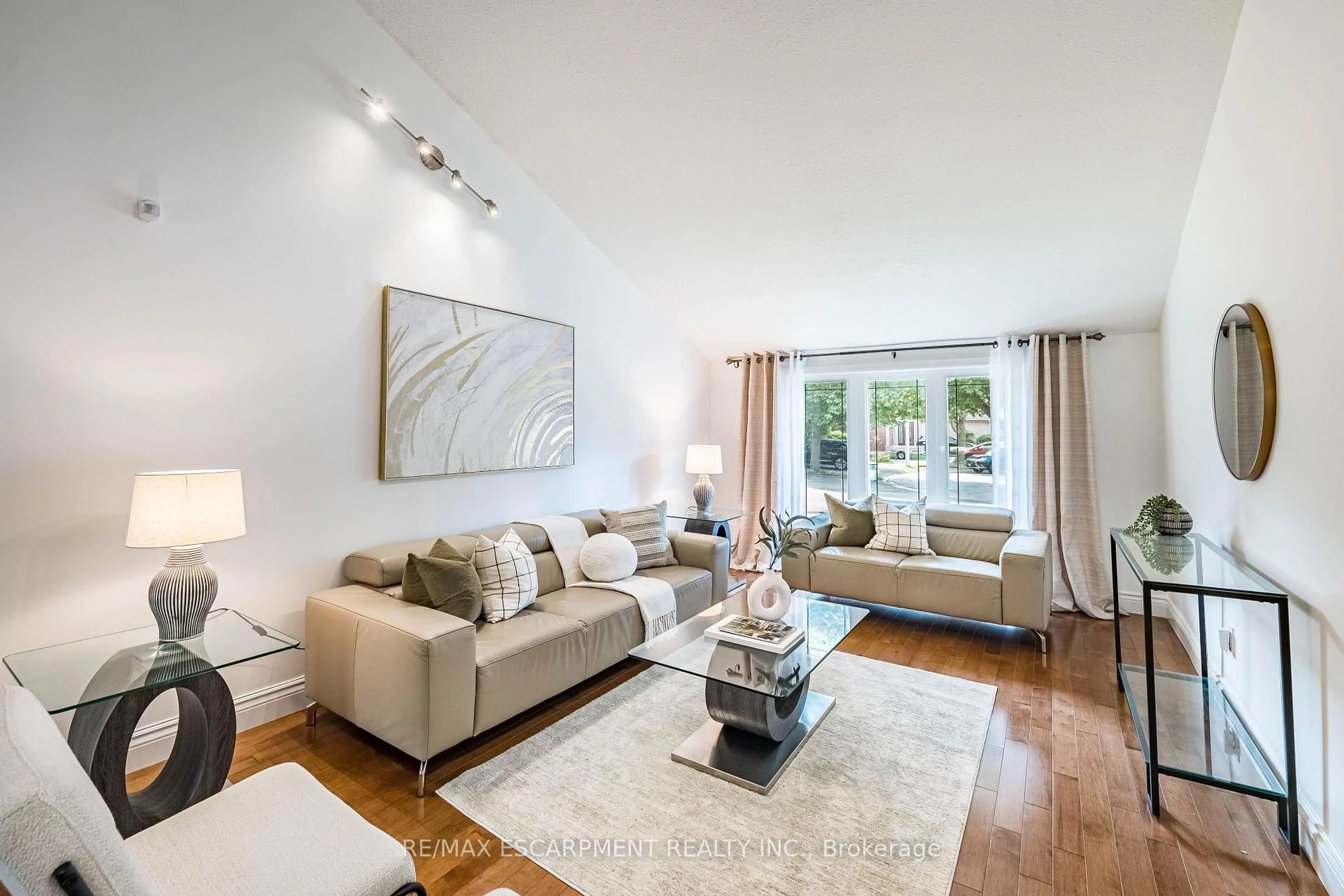Living room with furniture, unknown for 16 Ackrow Crt, Toronto Ontario M9C 5C4