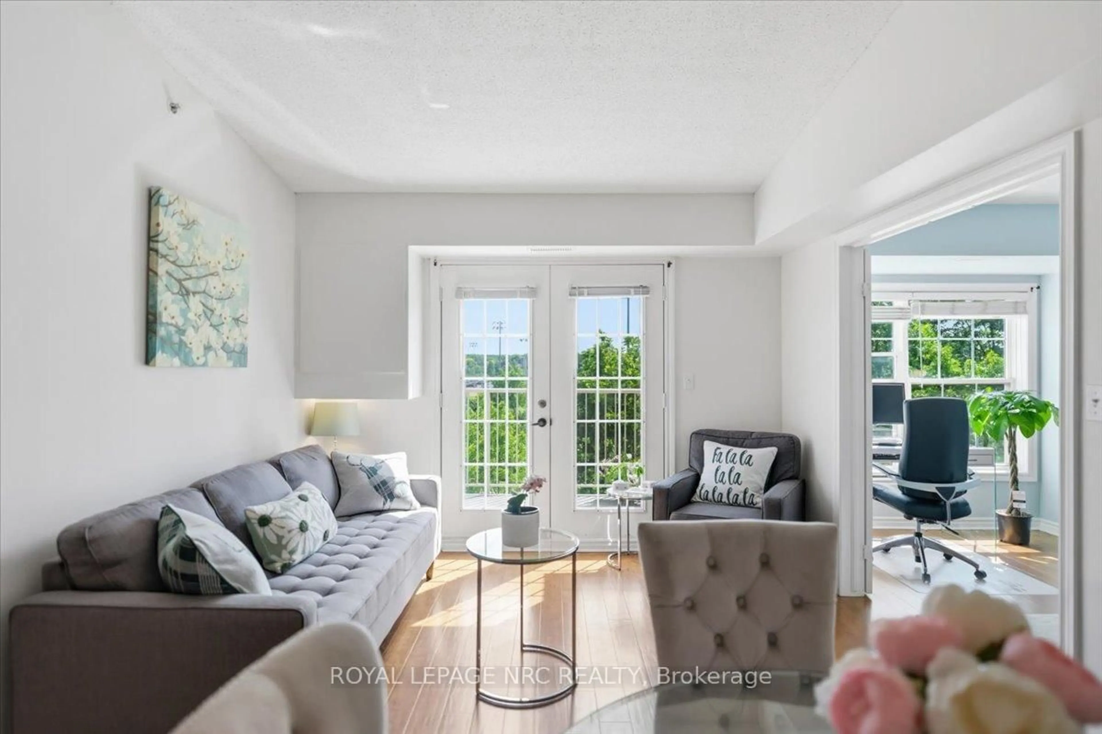 Living room with furniture, unknown for 1450 Bishops Gate #409, Oakville Ontario L6M 4N1