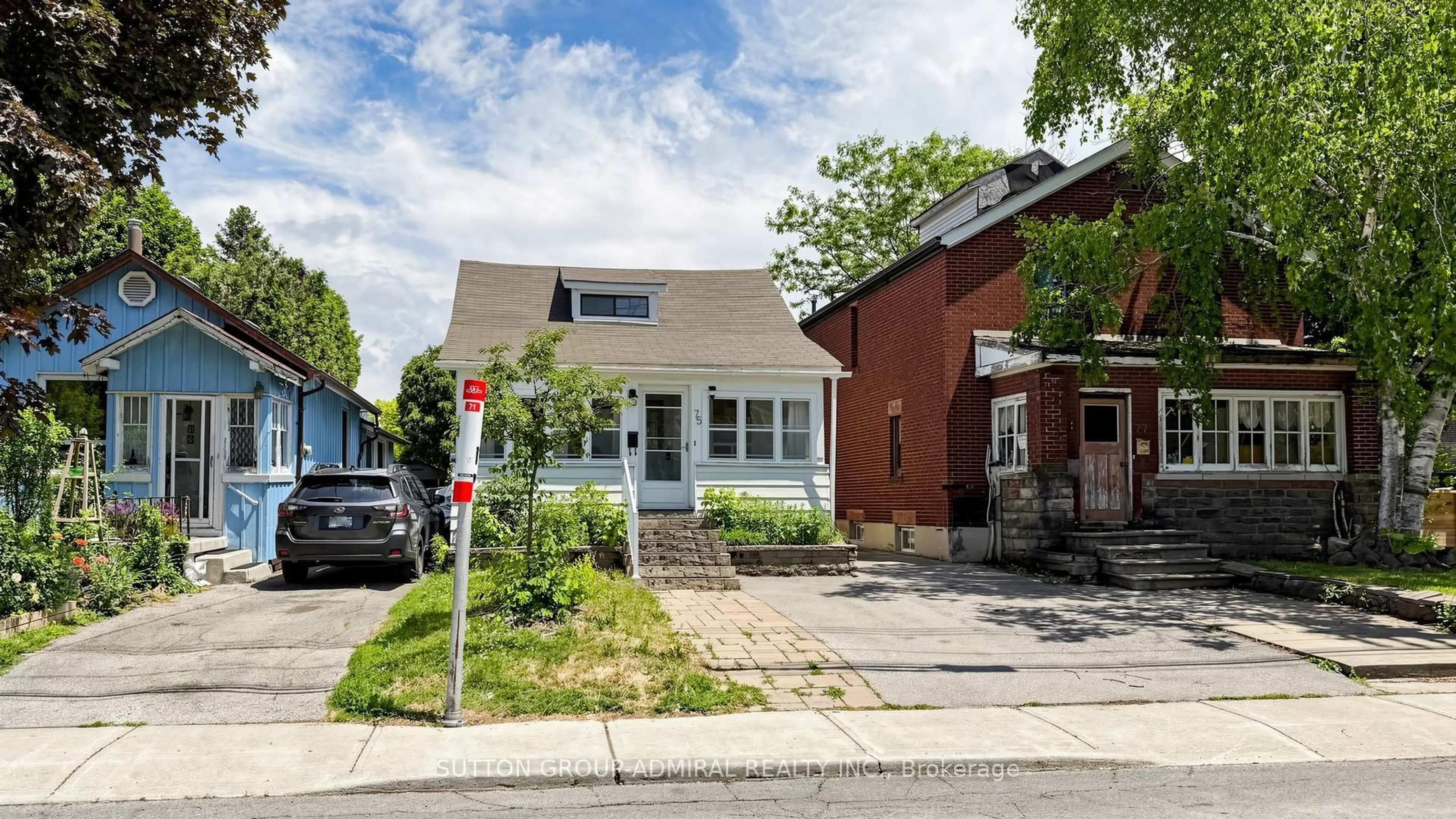 Home with brick exterior material, street for 75 Rockcliffe Blvd, Toronto Ontario M6N 4R4