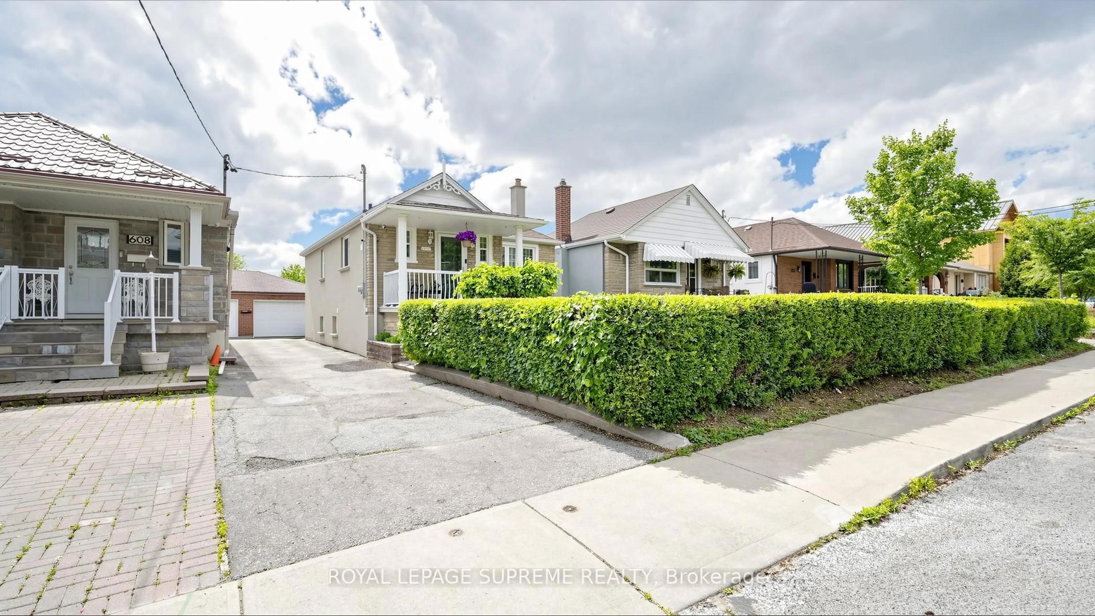 A pic from outside/outdoor area/front of a property/back of a property/a pic from drone, street for 610 Mcroberts Ave, Toronto Ontario M6E 4R7