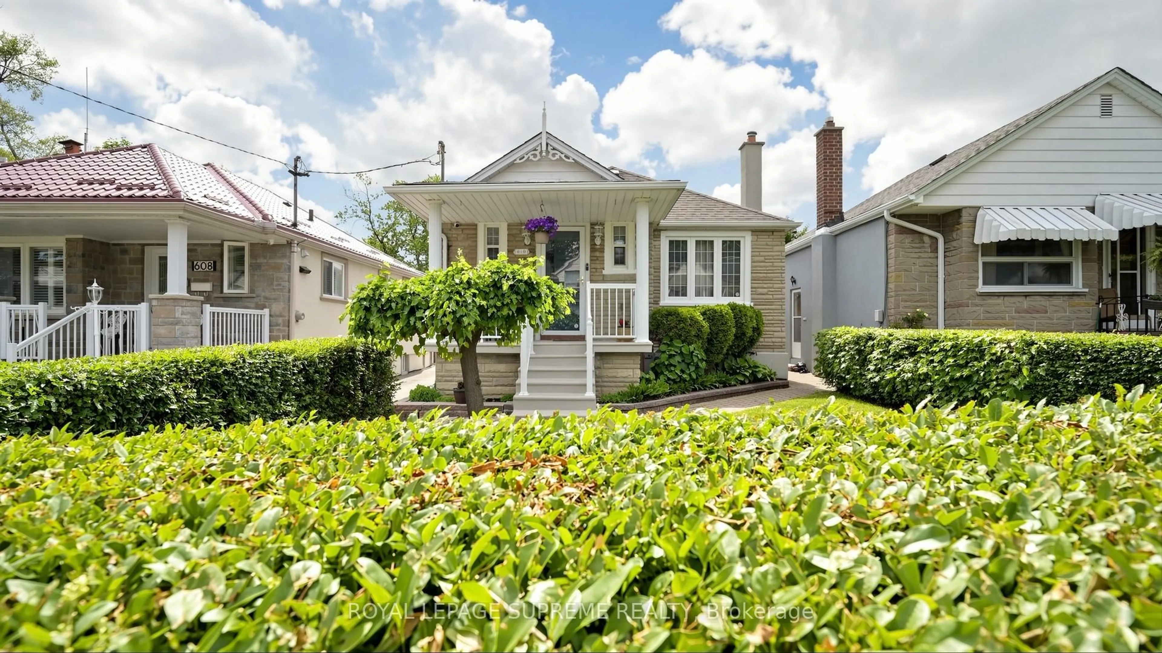 Home with vinyl exterior material, street for 610 Mcroberts Ave, Toronto Ontario M6E 4R7