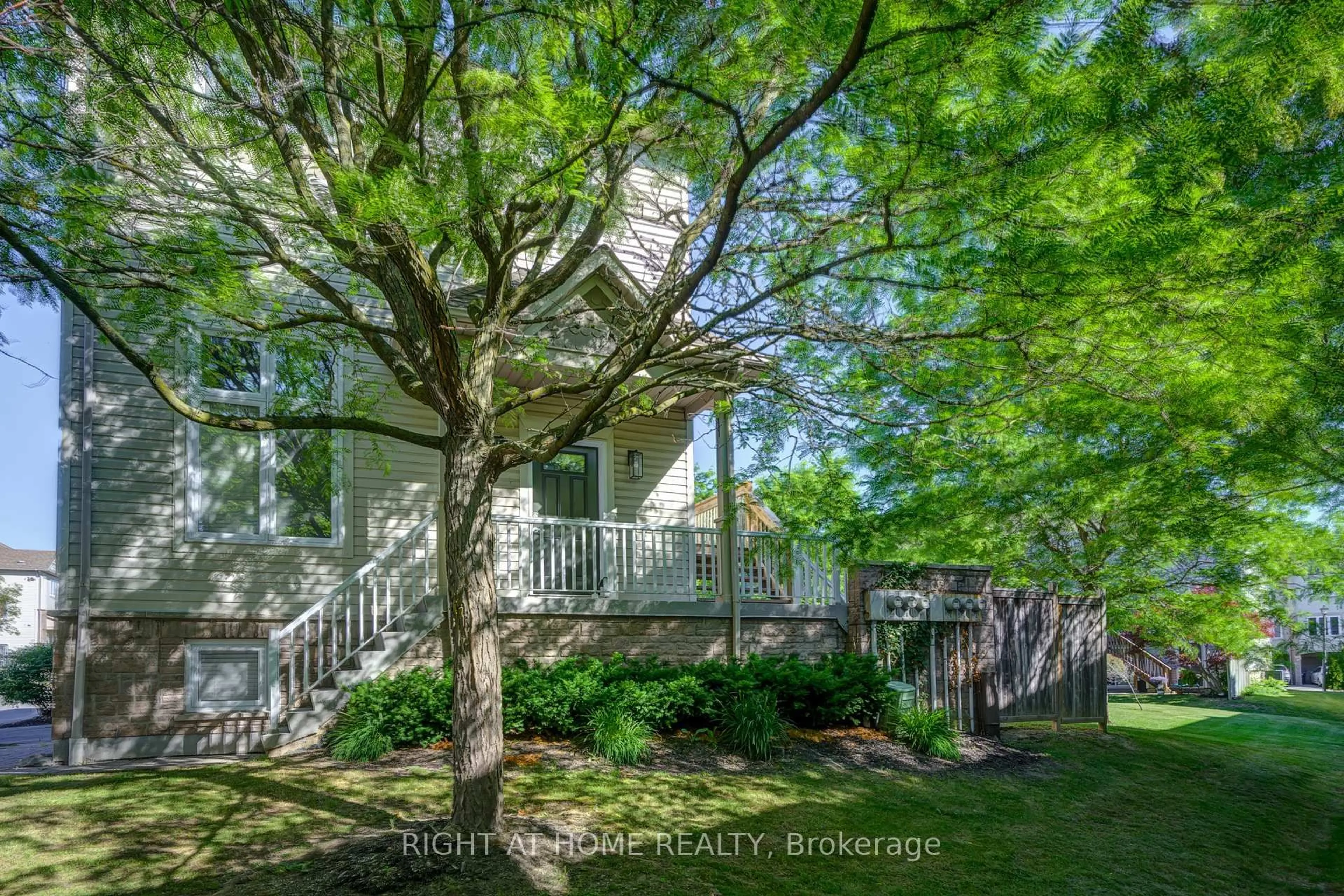 A pic from outside/outdoor area/front of a property/back of a property/a pic from drone, forest/trees view for 7101 Branigan Gate #29, Mississauga Ontario L5N 7S2