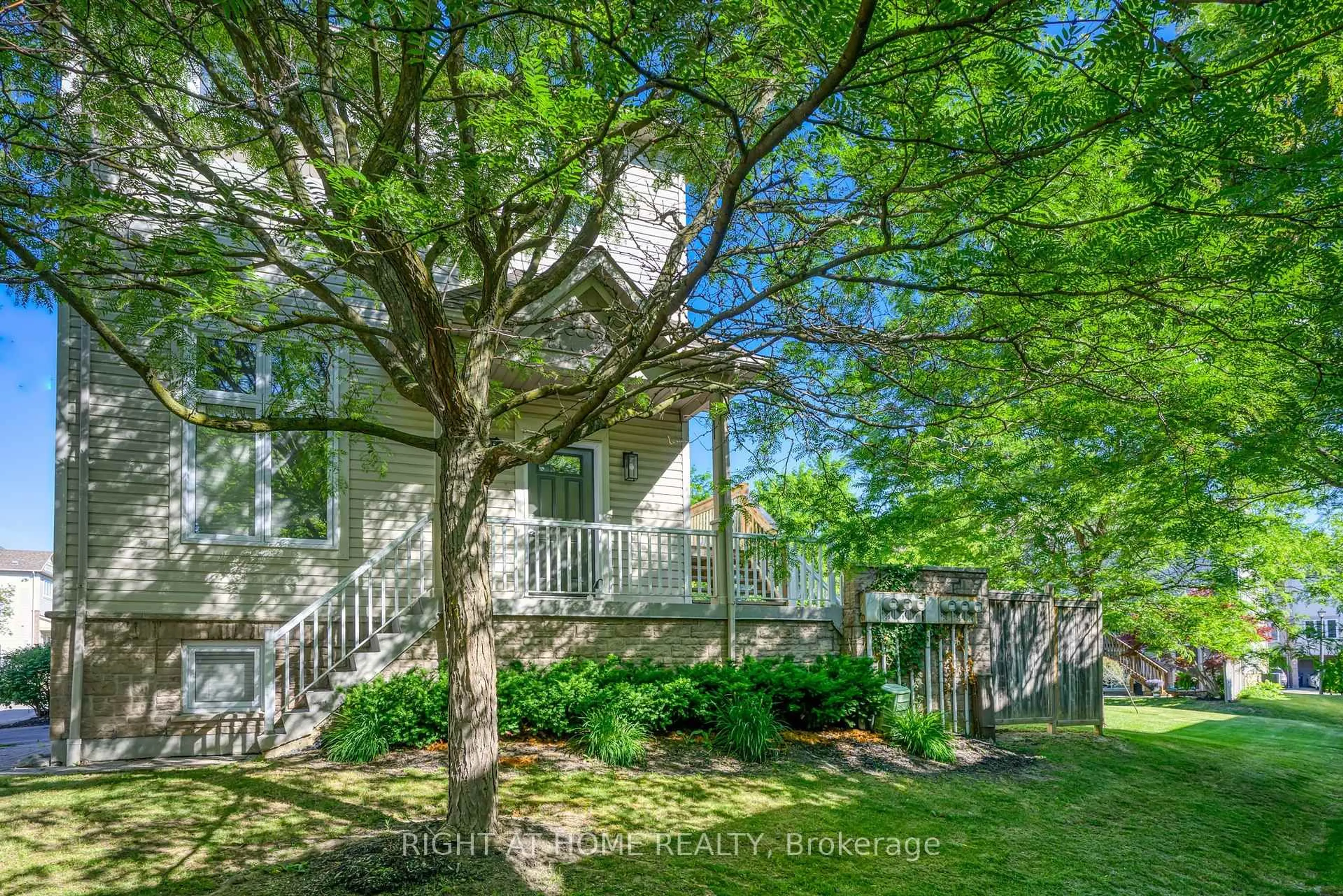 A pic from outside/outdoor area/front of a property/back of a property/a pic from drone, forest/trees view for 7101 Branigan Gate #29, Mississauga Ontario L5N 7S2