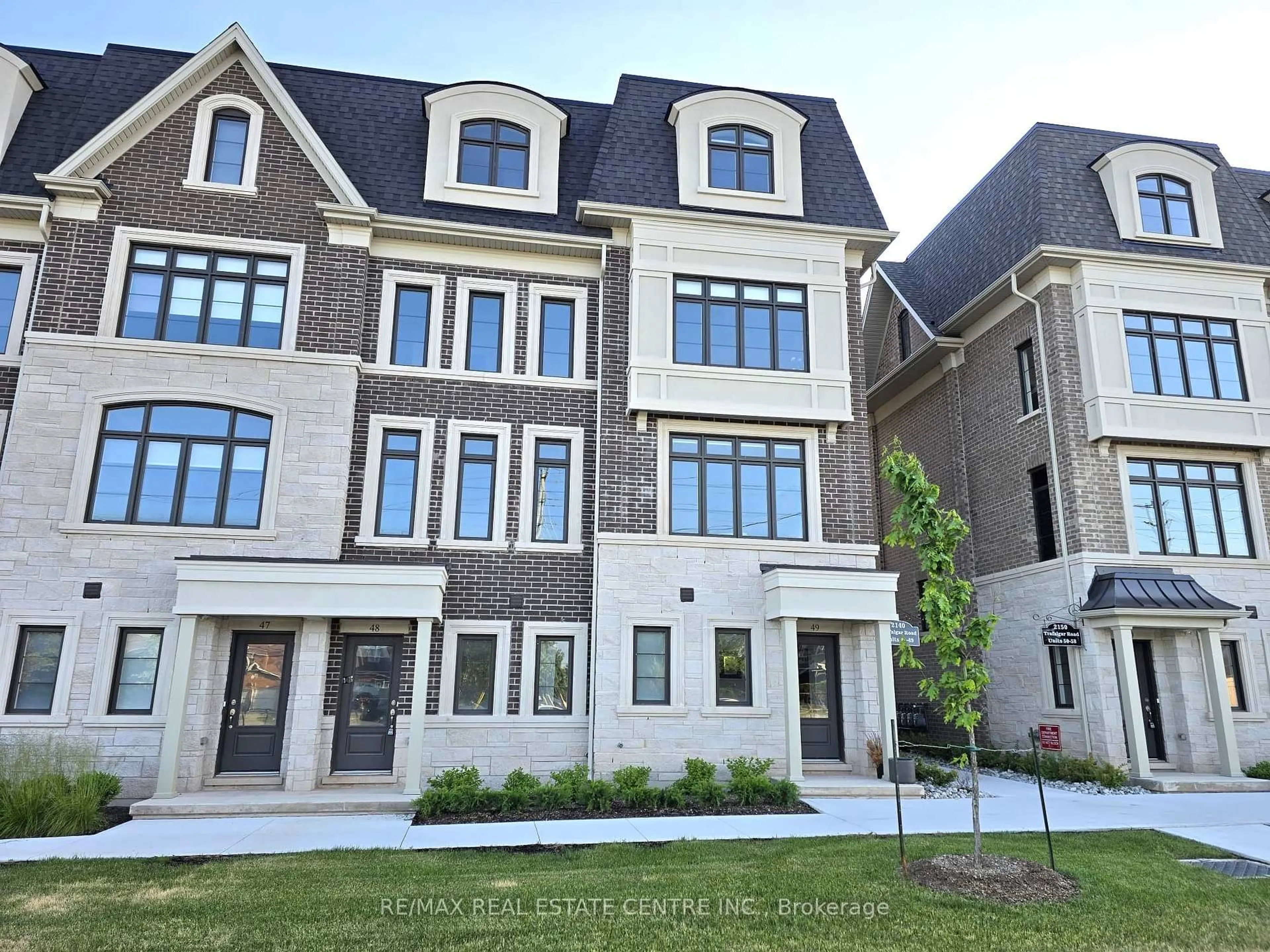 Home with brick exterior material, unknown for 2140 Trafalgar Rd #49, Oakville Ontario L6H 7H2