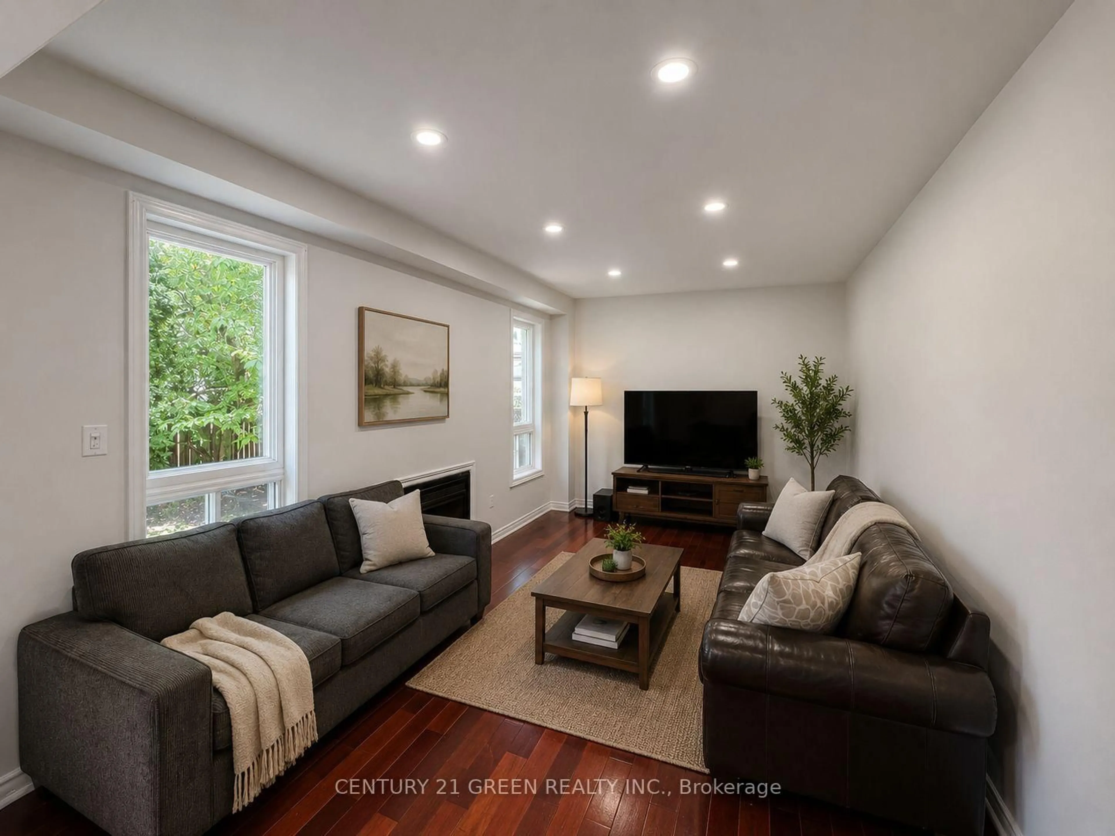 Living room with furniture, wood/laminate floor for 20 Outlook Ave, Brampton Ontario L6Y 5N9