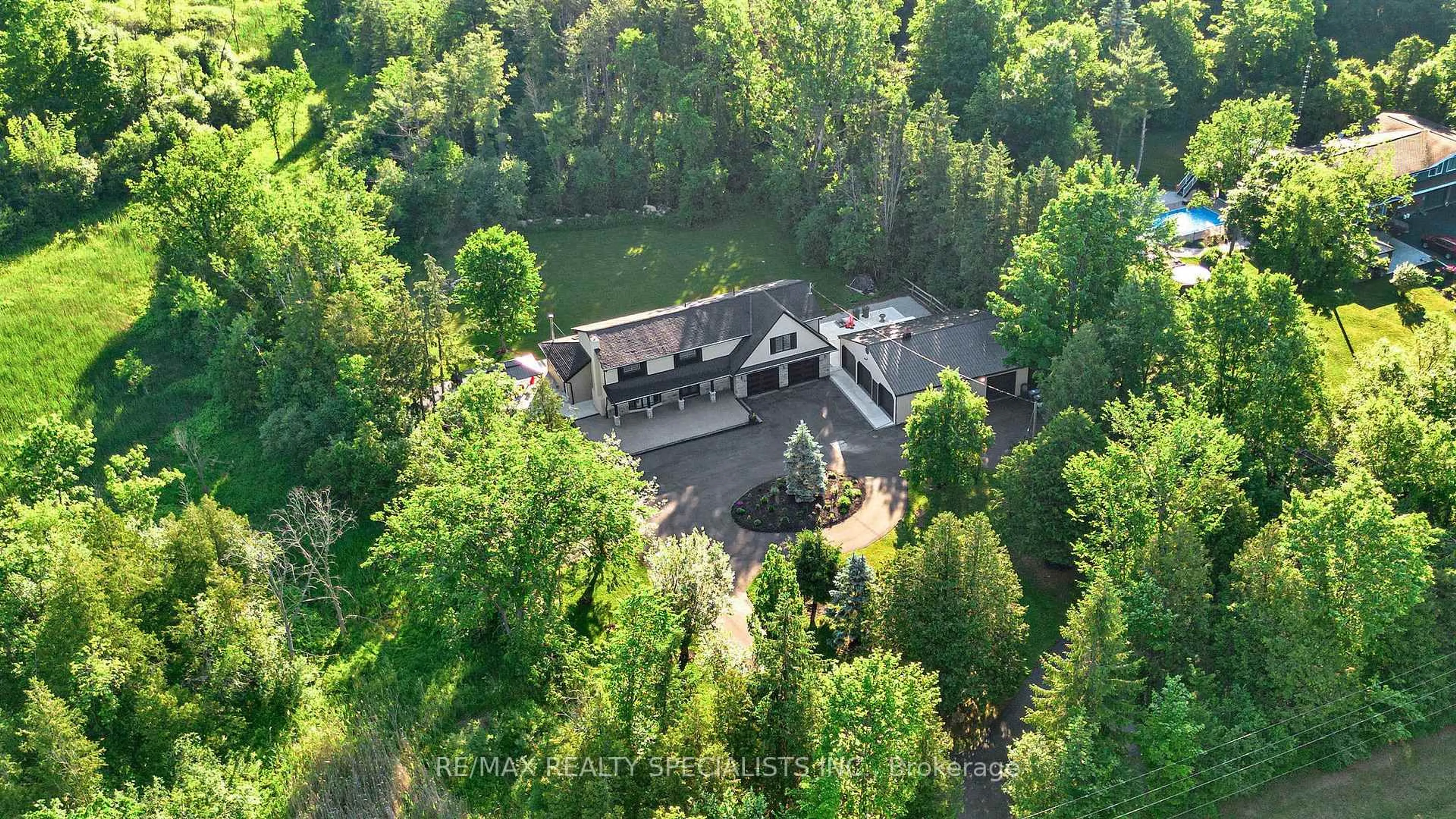 A pic from outside/outdoor area/front of a property/back of a property/a pic from drone, forest/trees view for 14451 Winston Churchill Blvd, Caledon Ontario L7C 1S7