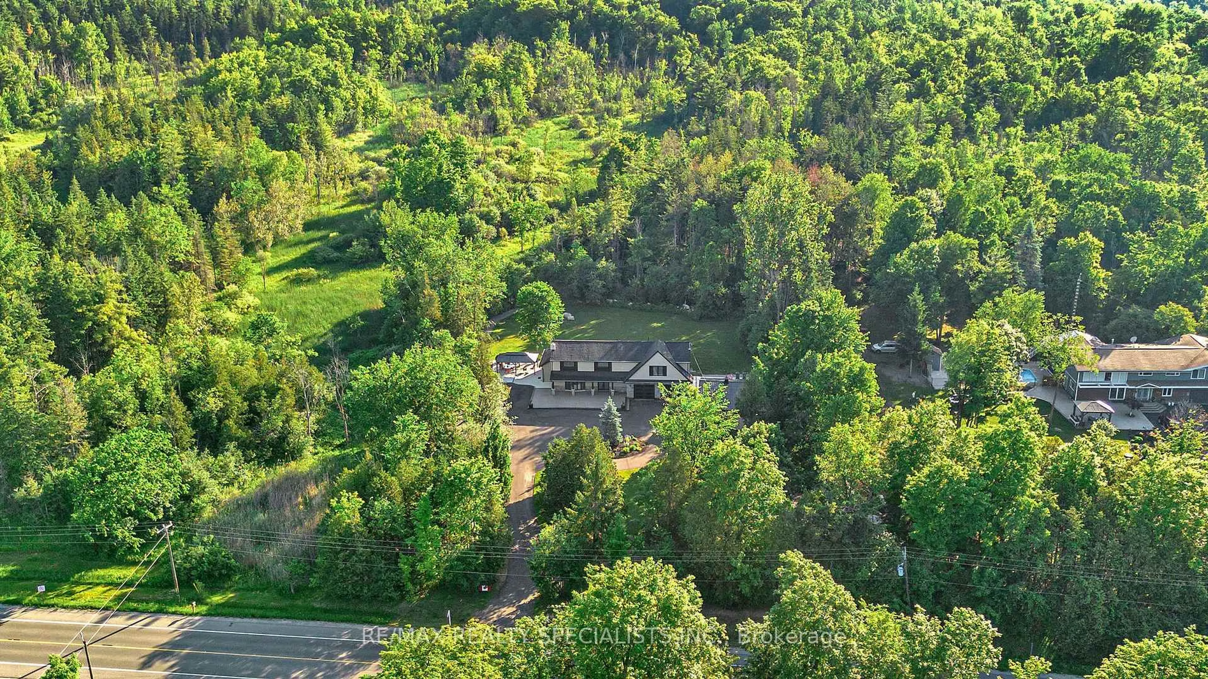 A pic from outside/outdoor area/front of a property/back of a property/a pic from drone, forest/trees view for 14451 Winston Churchill Blvd, Caledon Ontario L7C 1S7
