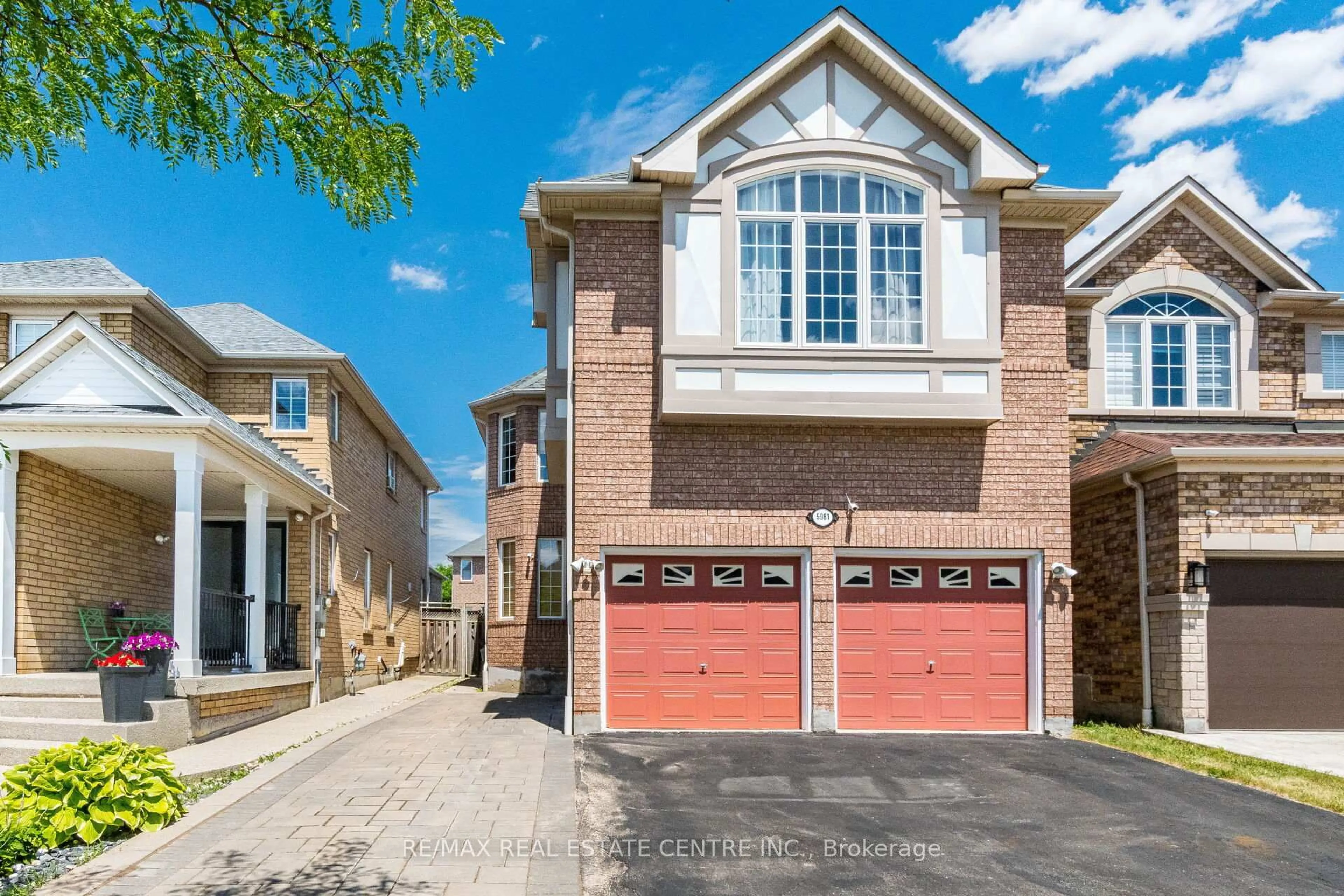 Home with brick exterior material, street for 5981 Couples St, Mississauga Ontario L5V 2Z5
