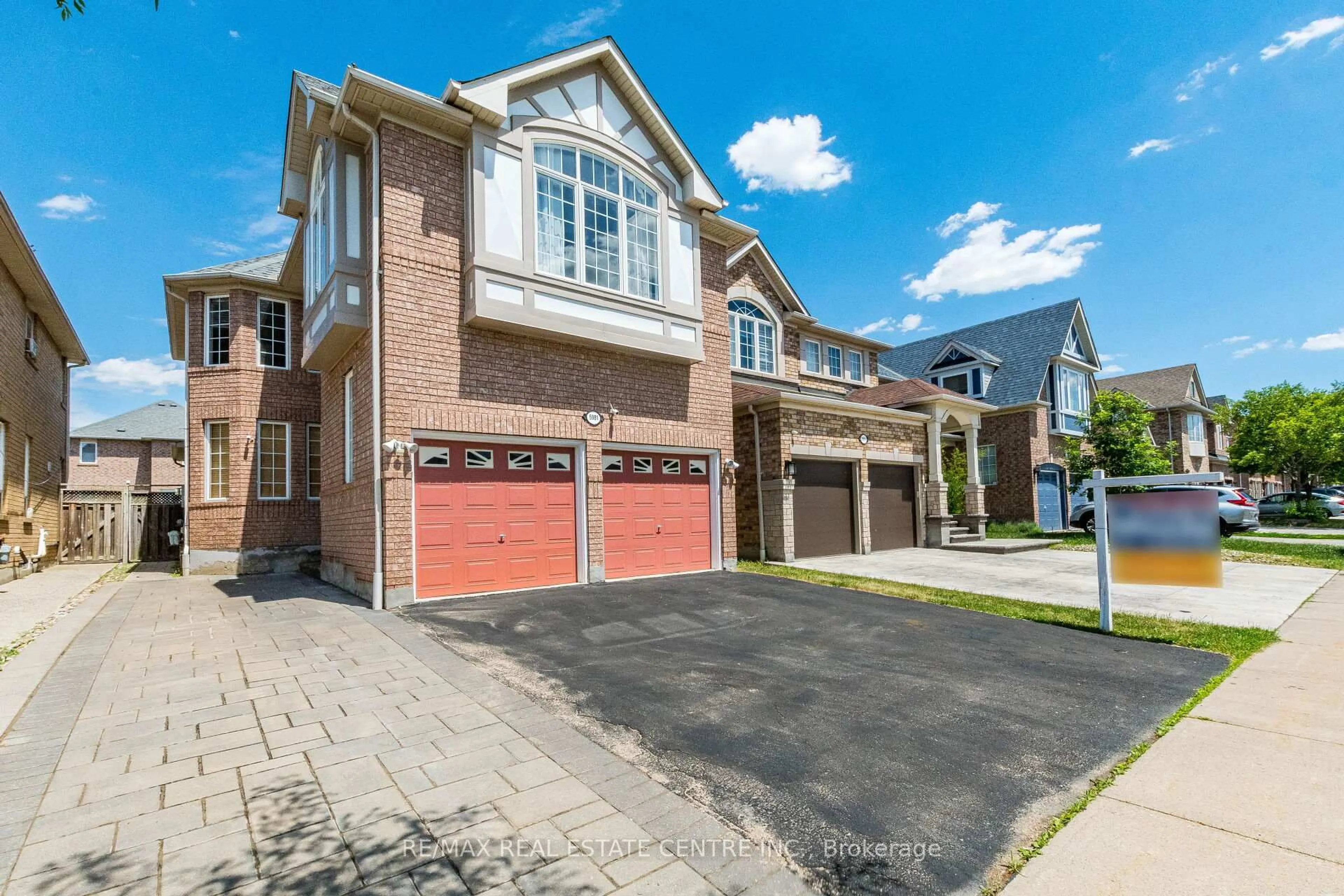 Home with brick exterior material, street for 5981 Couples St, Mississauga Ontario L5V 2Z5