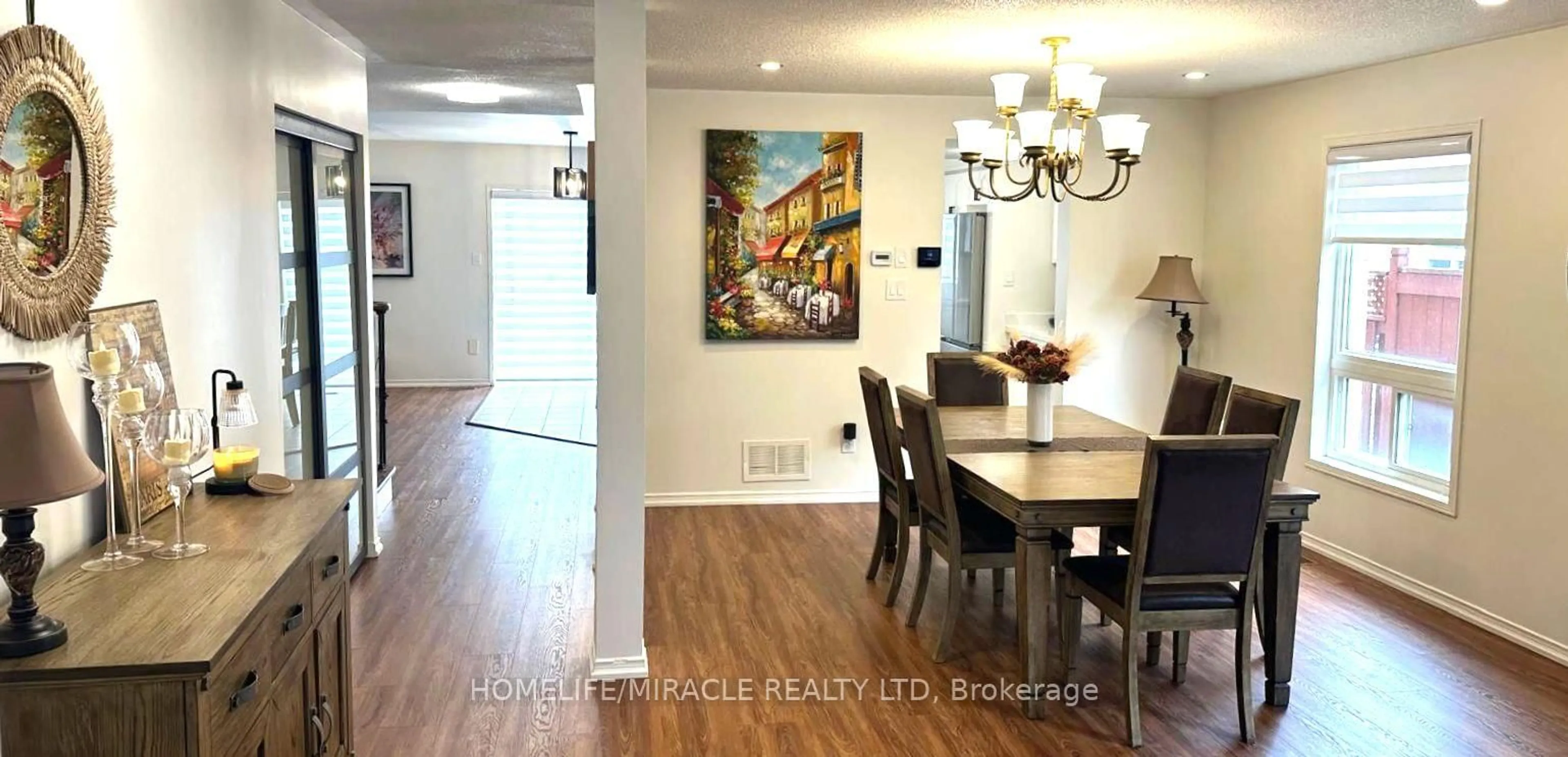 Dining room, wood/laminate floor for 65 Fairhill Ave, Brampton Ontario L7A 2E8