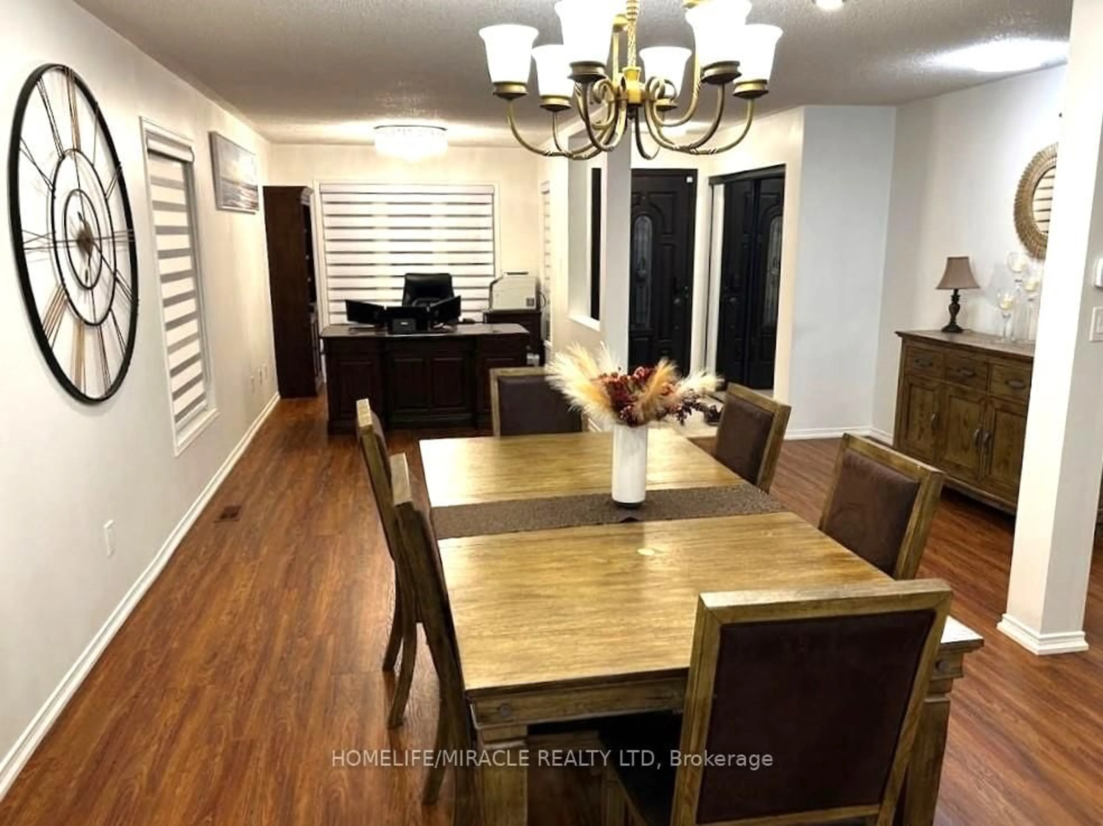 Dining room, wood/laminate floor for 65 Fairhill Ave, Brampton Ontario L7A 2E8