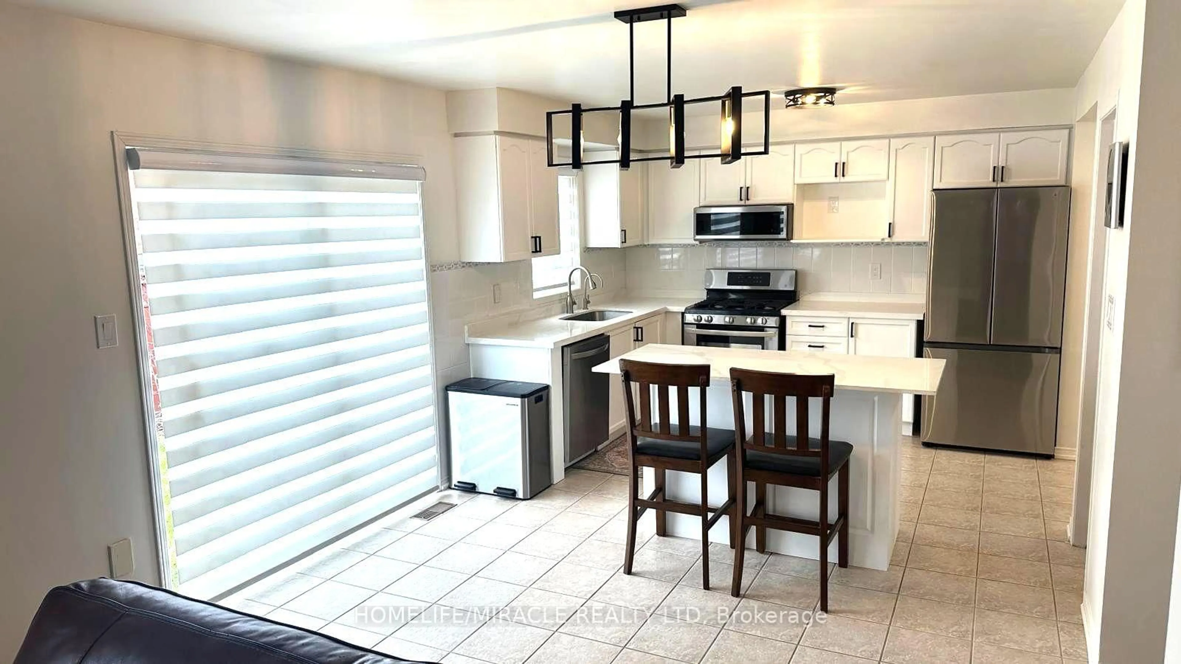 Open concept kitchen, ceramic/tile floor for 65 Fairhill Ave, Brampton Ontario L7A 2E8