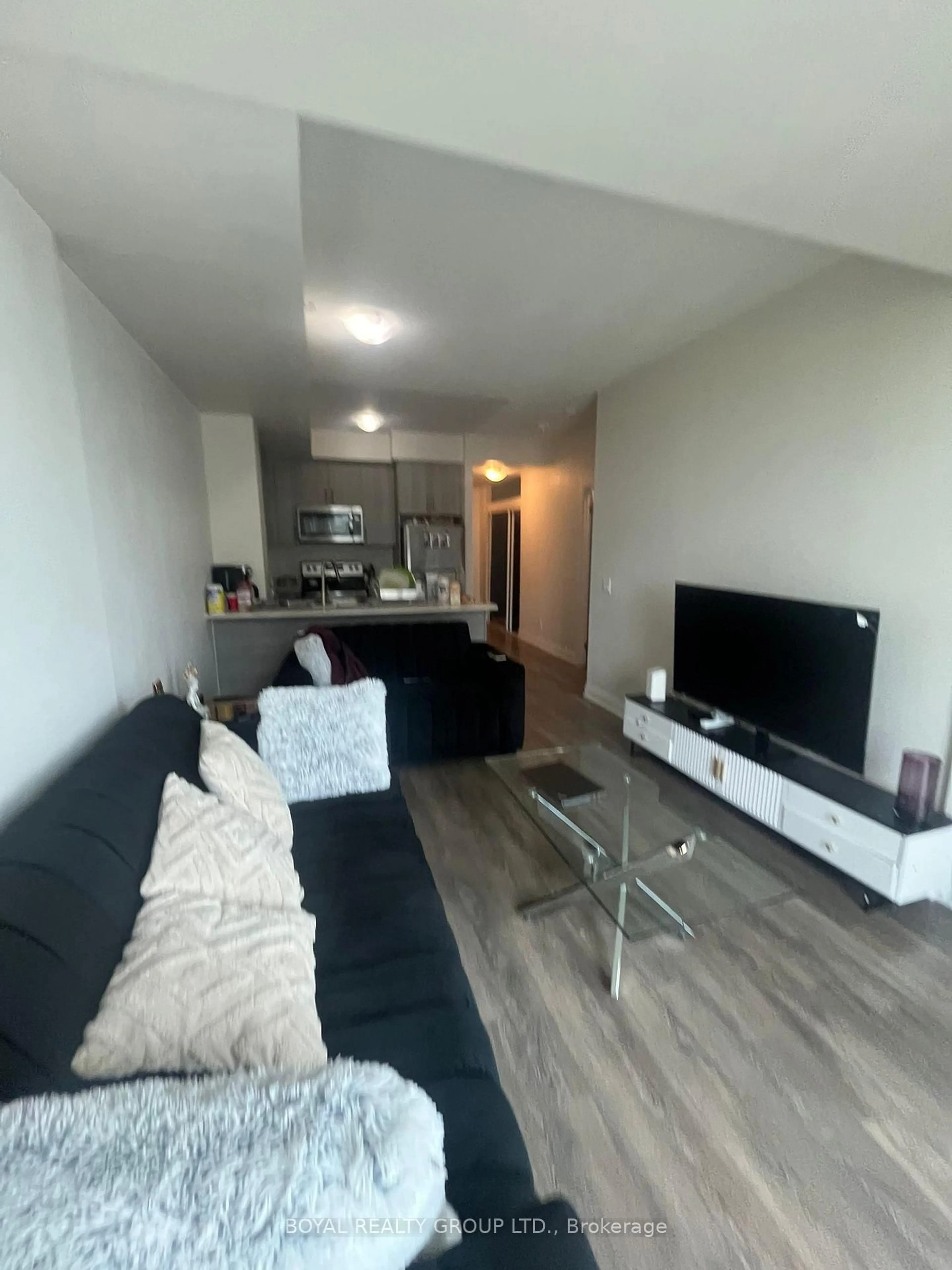 Living room with furniture, unknown for 65 Yorkland Blvd #1008, Brampton Ontario L6P 4M5