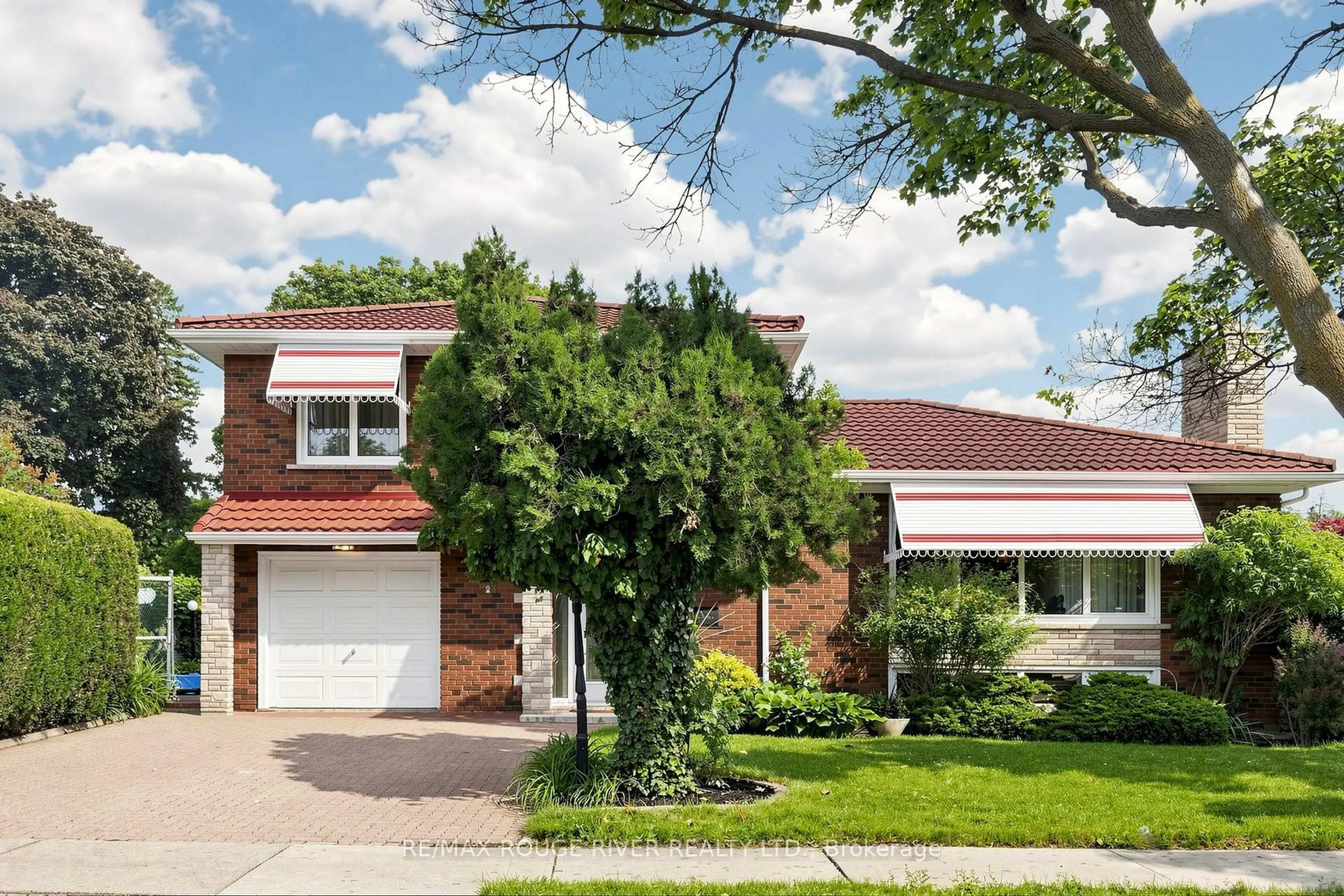 Home with brick exterior material, street for 2 Faversham Cres, Toronto Ontario M9C 3X4