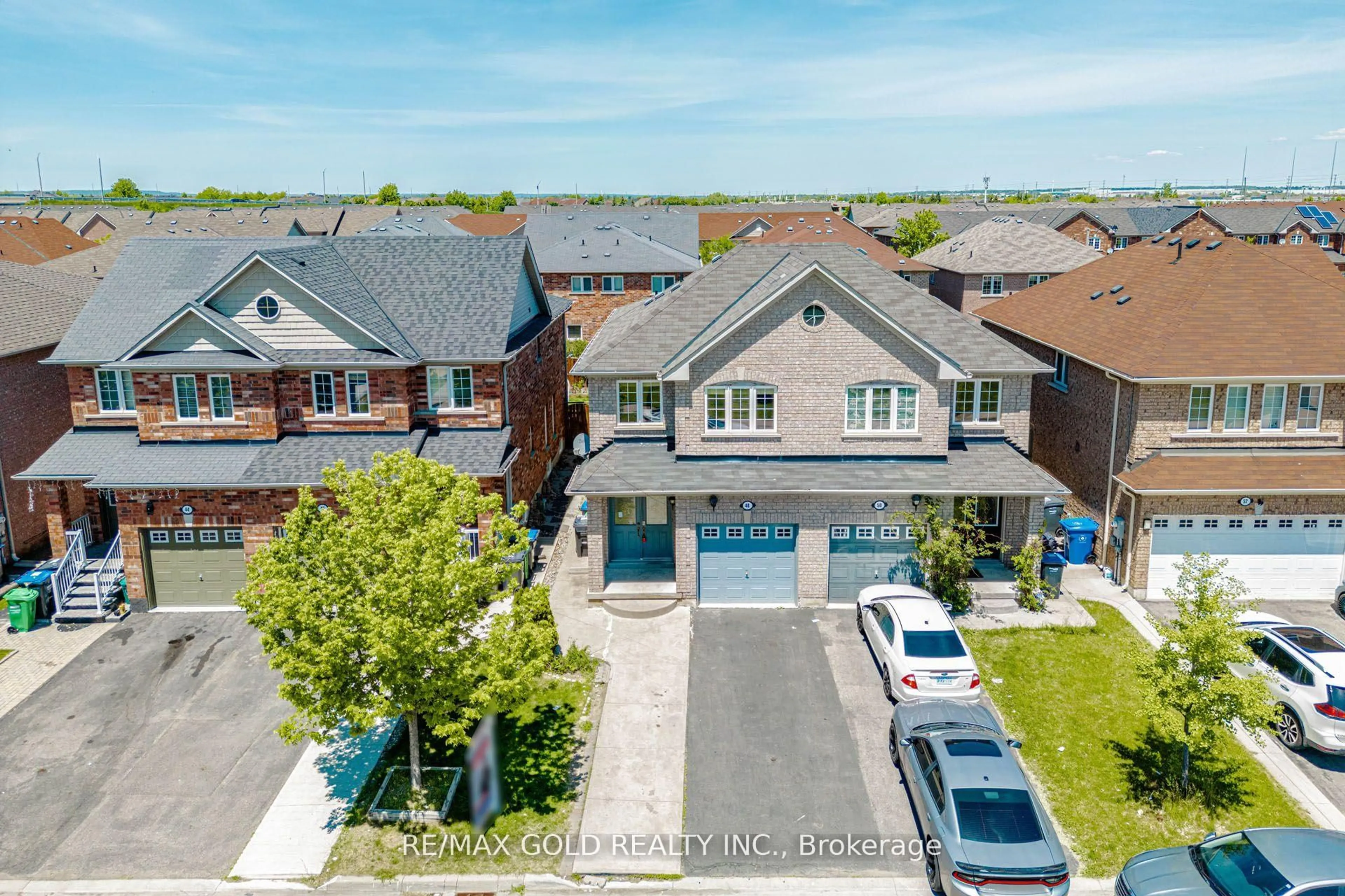 A pic from outside/outdoor area/front of a property/back of a property/a pic from drone, street for 48 Sugarberry Dr, Brampton Ontario L6X 0K2
