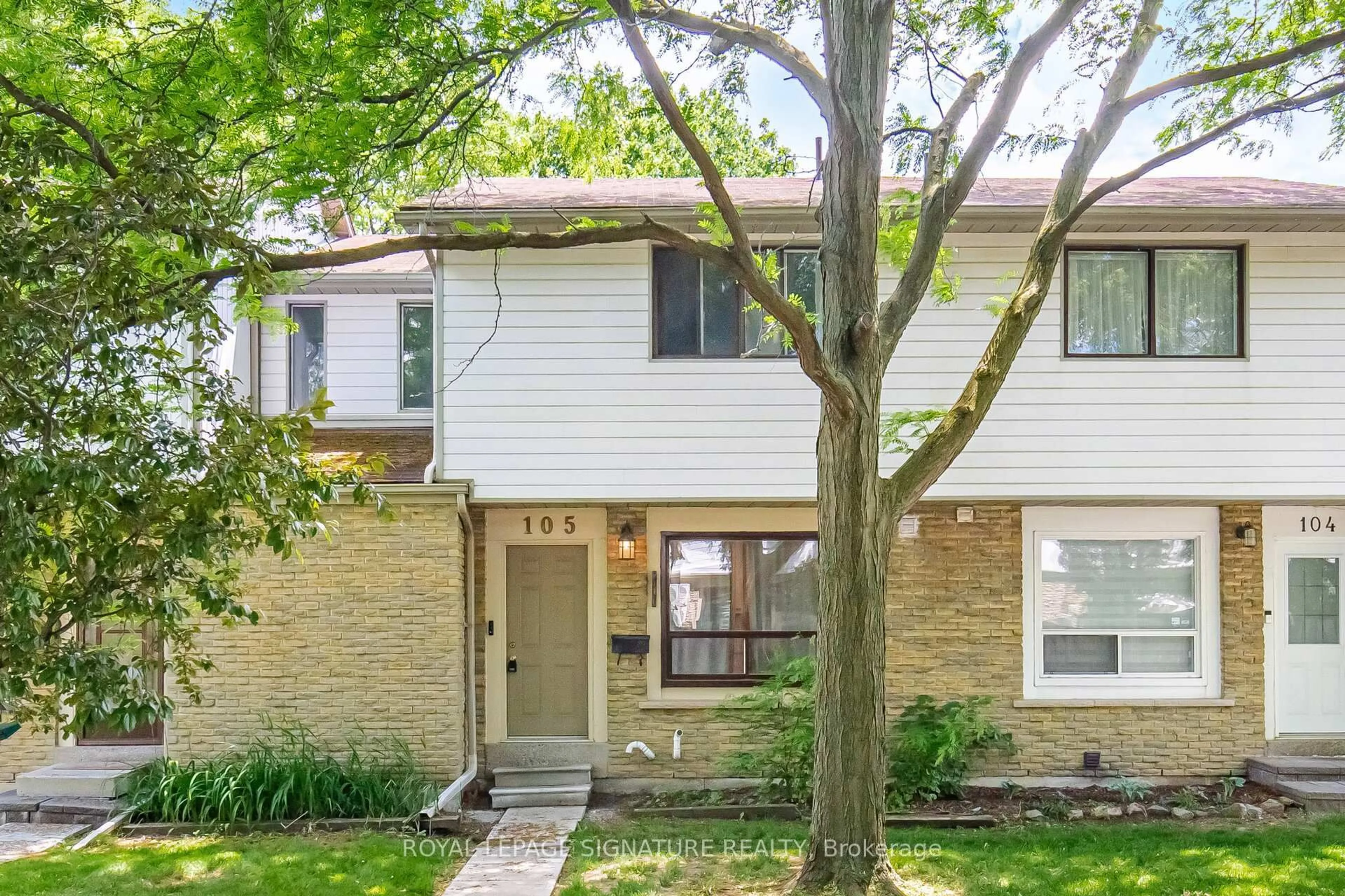 Home with brick exterior material, street for 6540 Falconer Dr #105, Mississauga Ontario L5N 1M1