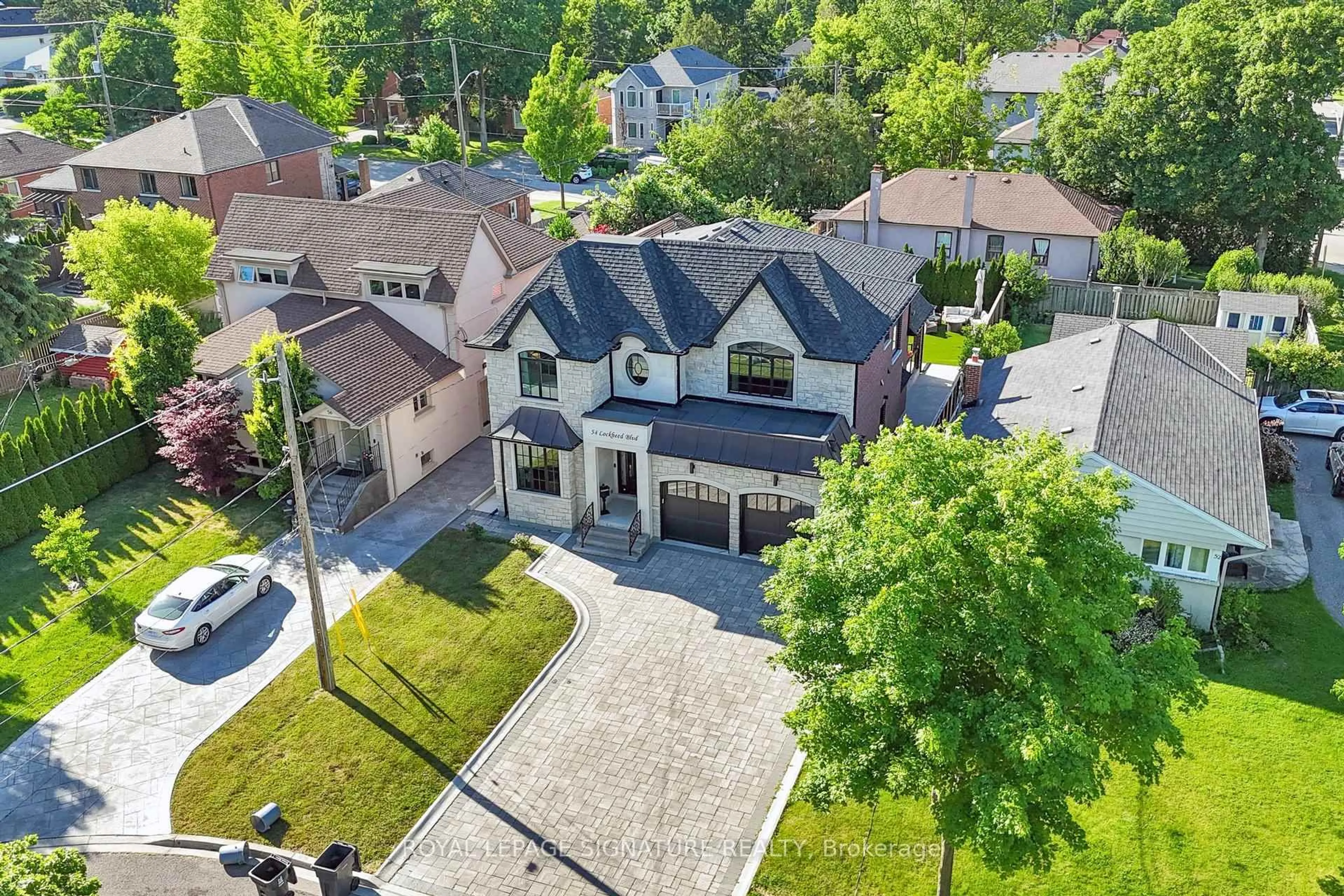 A pic from outside/outdoor area/front of a property/back of a property/a pic from drone, street for 54 Lockheed Blvd, Toronto Ontario M9P 2J1