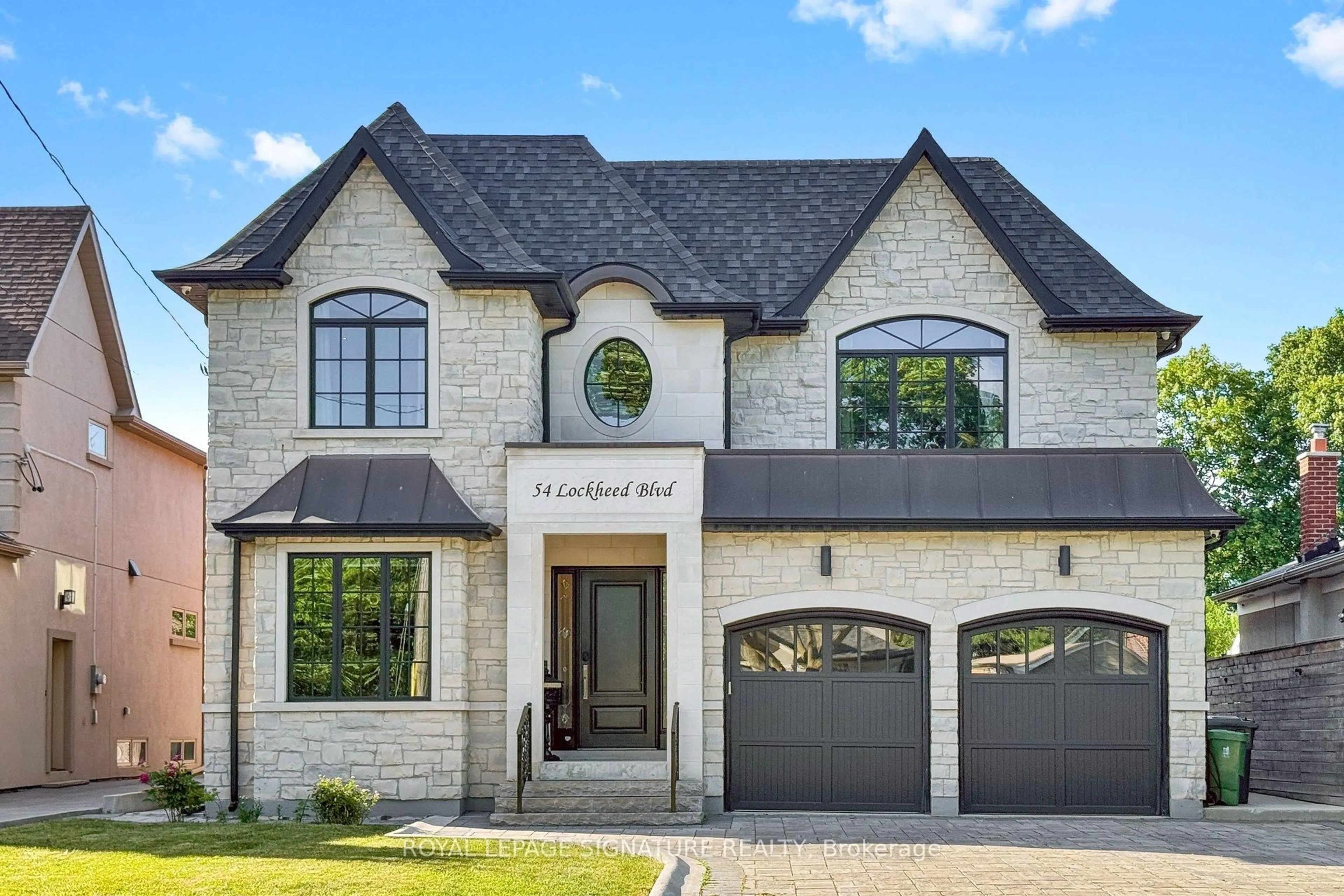 Home with brick exterior material, street for 54 Lockheed Blvd, Toronto Ontario M9P 2J1