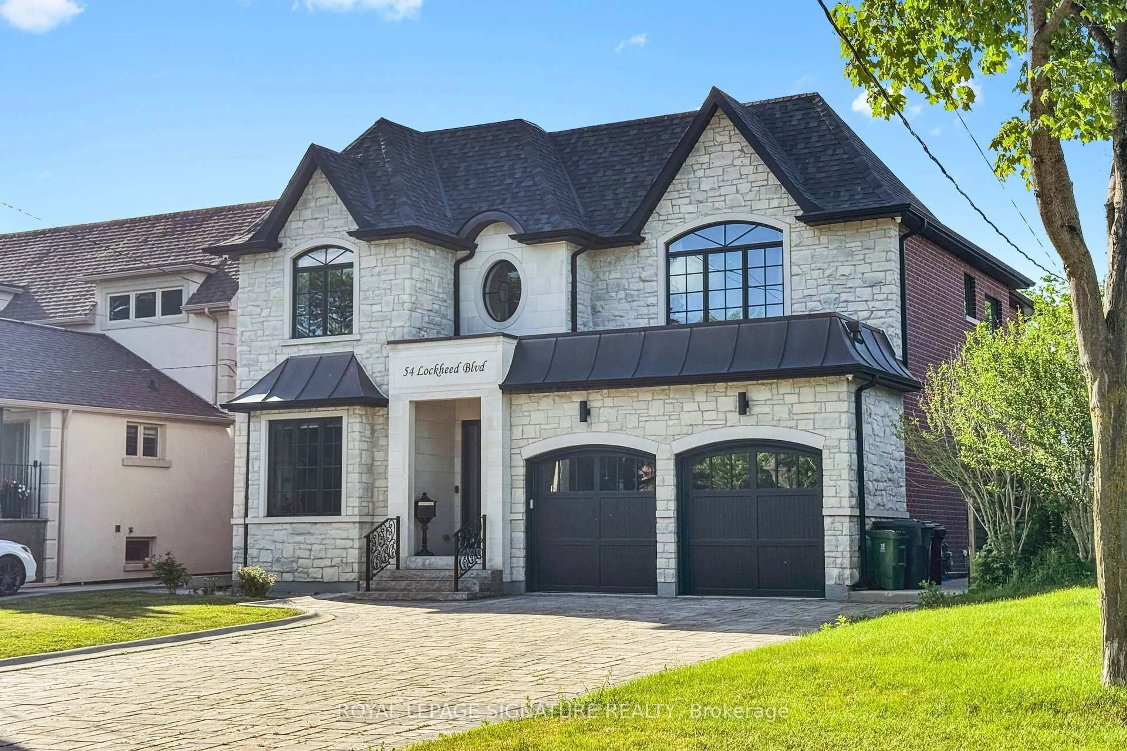 Home with brick exterior material, street for 54 Lockheed Blvd, Toronto Ontario M9P 2J1