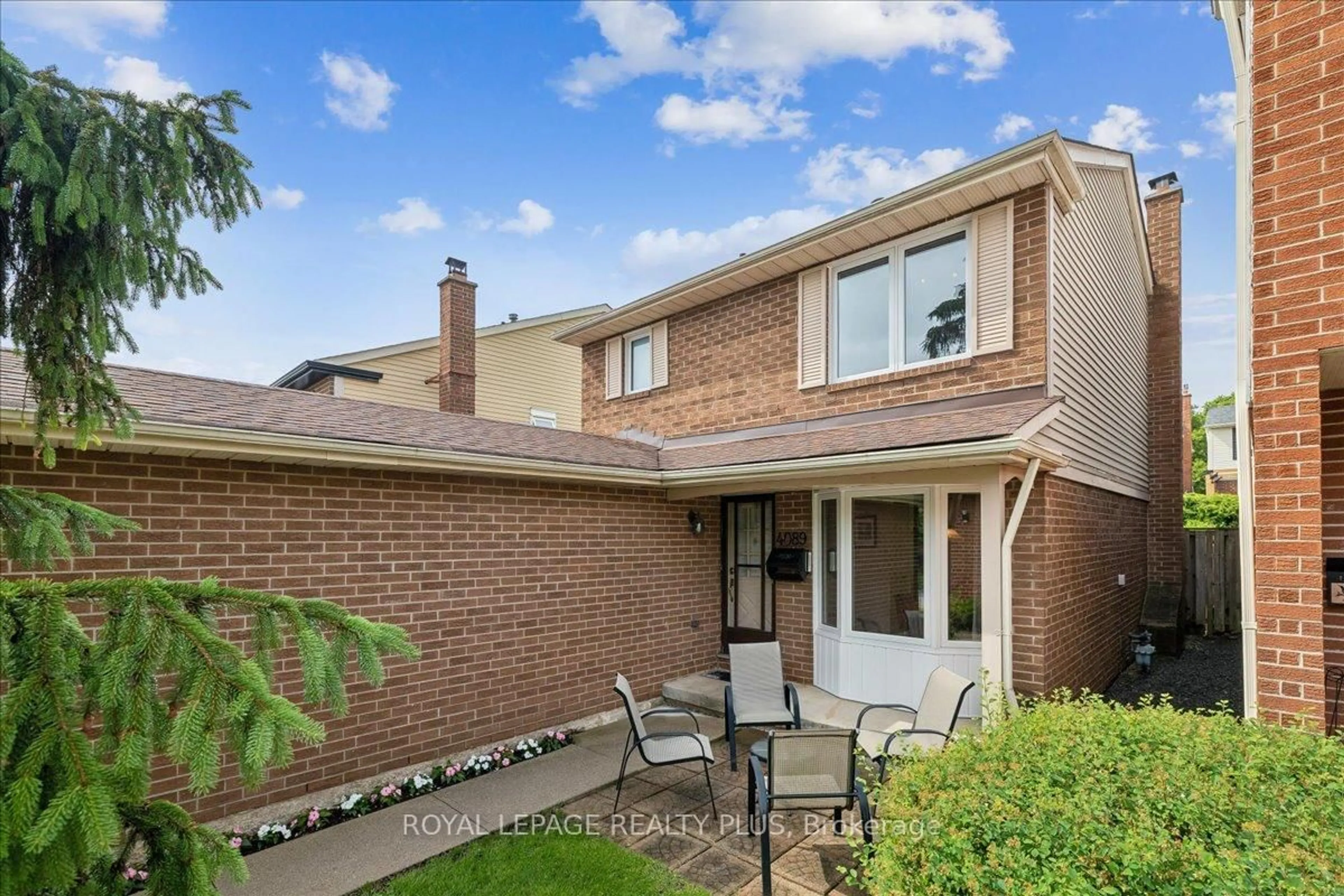 Home with brick exterior material, street for 4089 Stonemason Cres, Mississauga Ontario L5L 2Z6