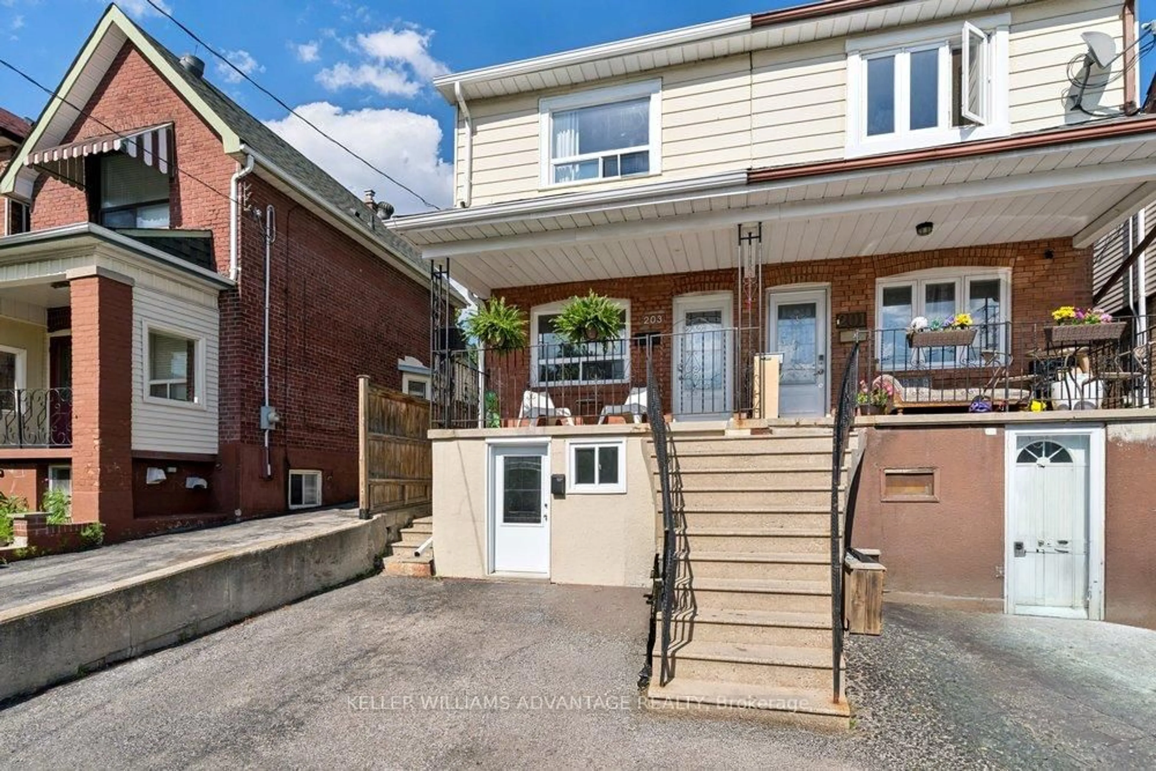 Home with brick exterior material, street for 203 Blackthorn Ave, Toronto Ontario M6N 3H7