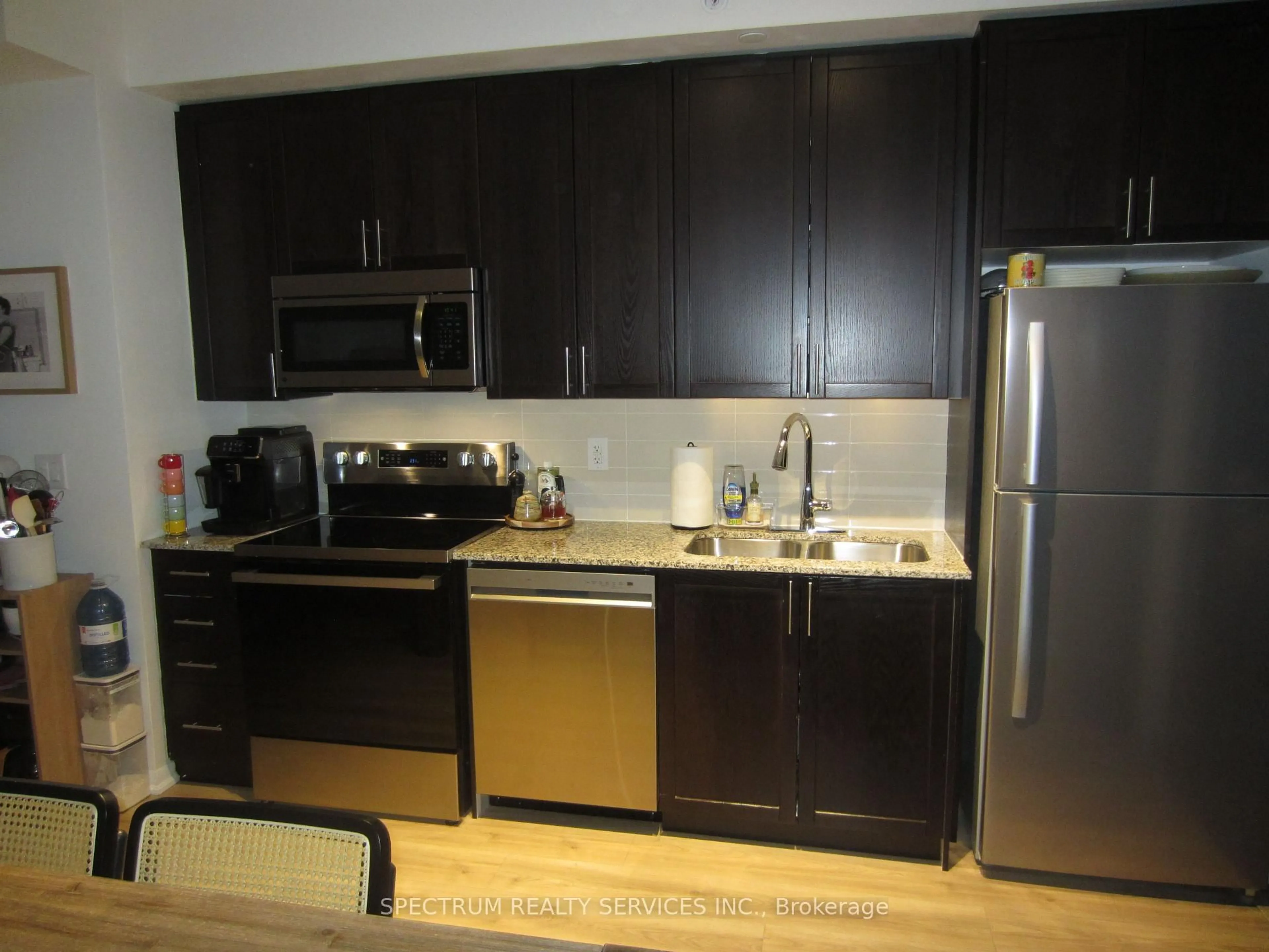 Standard kitchen, wood/laminate floor for 830 Lawrence Ave #212, Toronto Ontario M6A 0B6