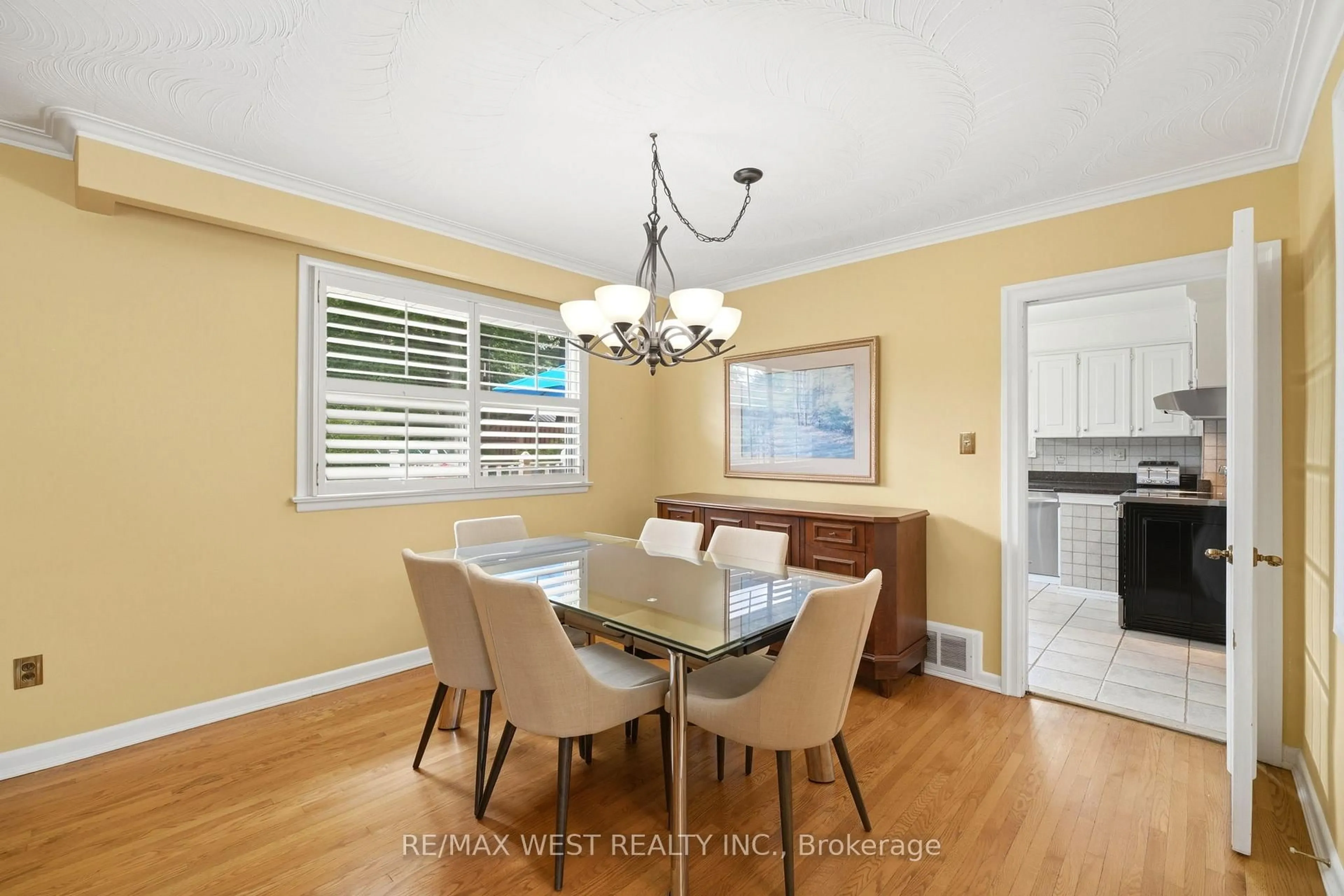 Dining room, wood/laminate floor for 2 Renault Cres, Toronto Ontario M9P 1J1