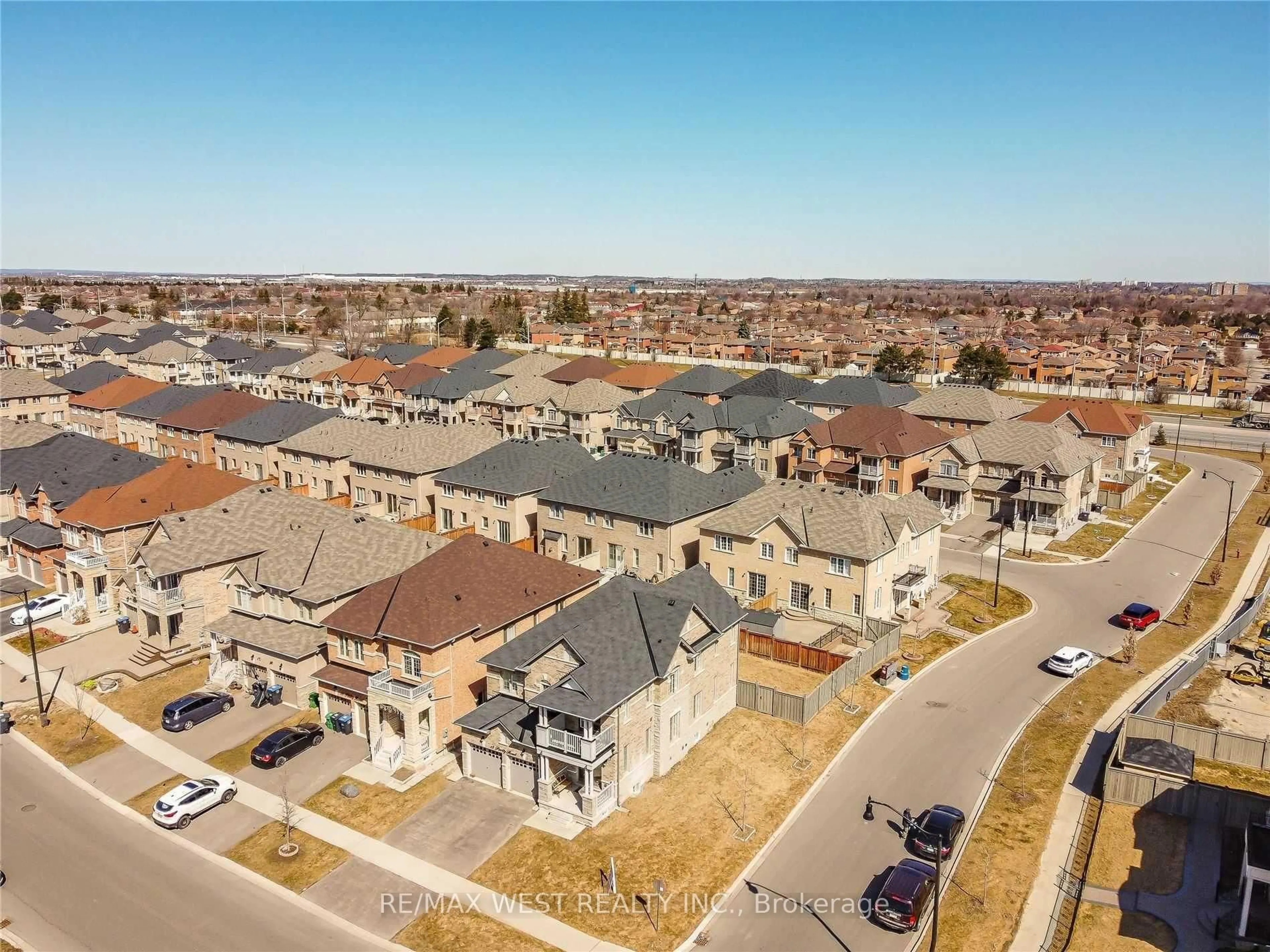 A pic from outside/outdoor area/front of a property/back of a property/a pic from drone, street for 13 Parity Rd, Brampton Ontario L6X 0E6