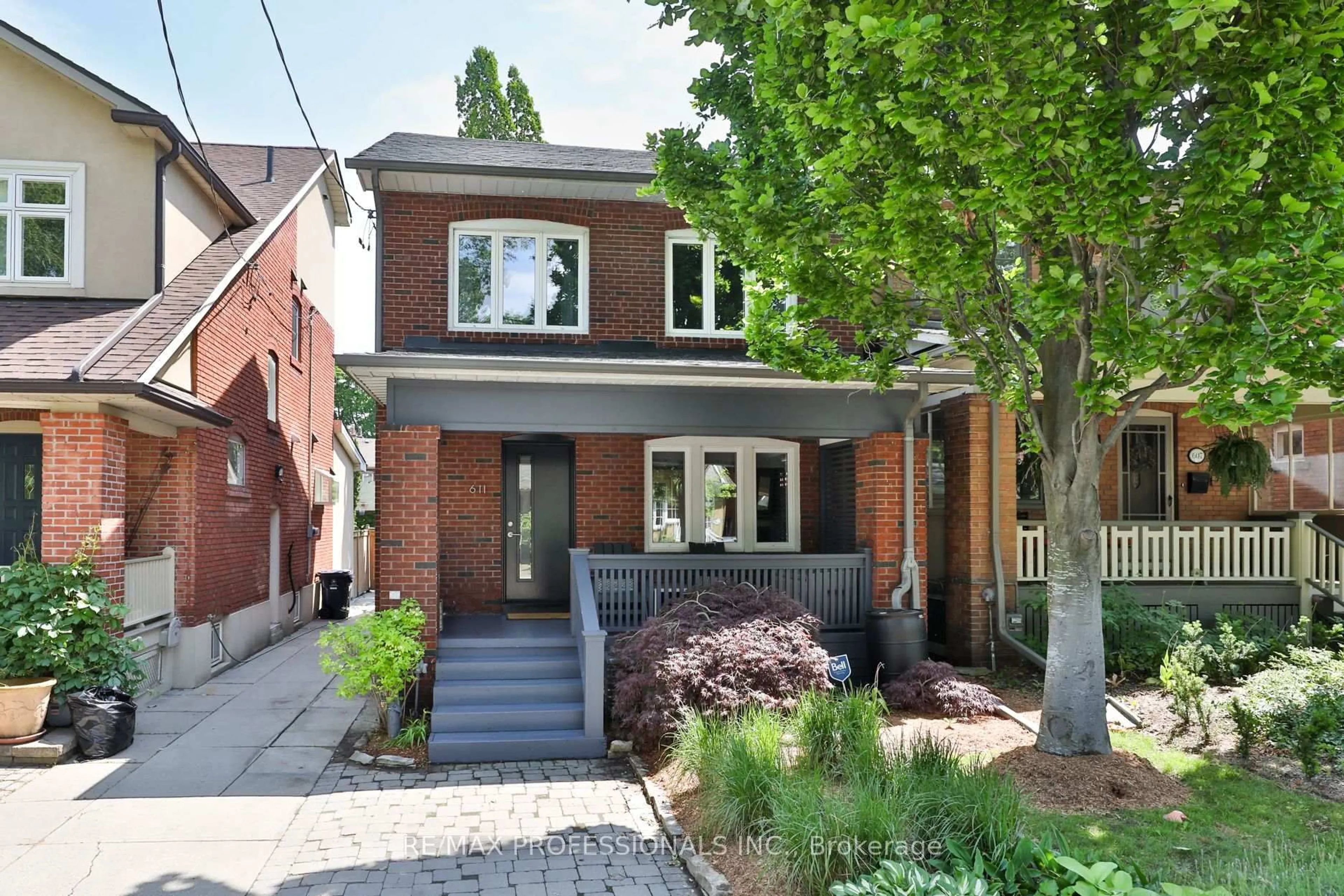 Home with brick exterior material, street for 611 Windermere Ave, Toronto Ontario M6S 3L9