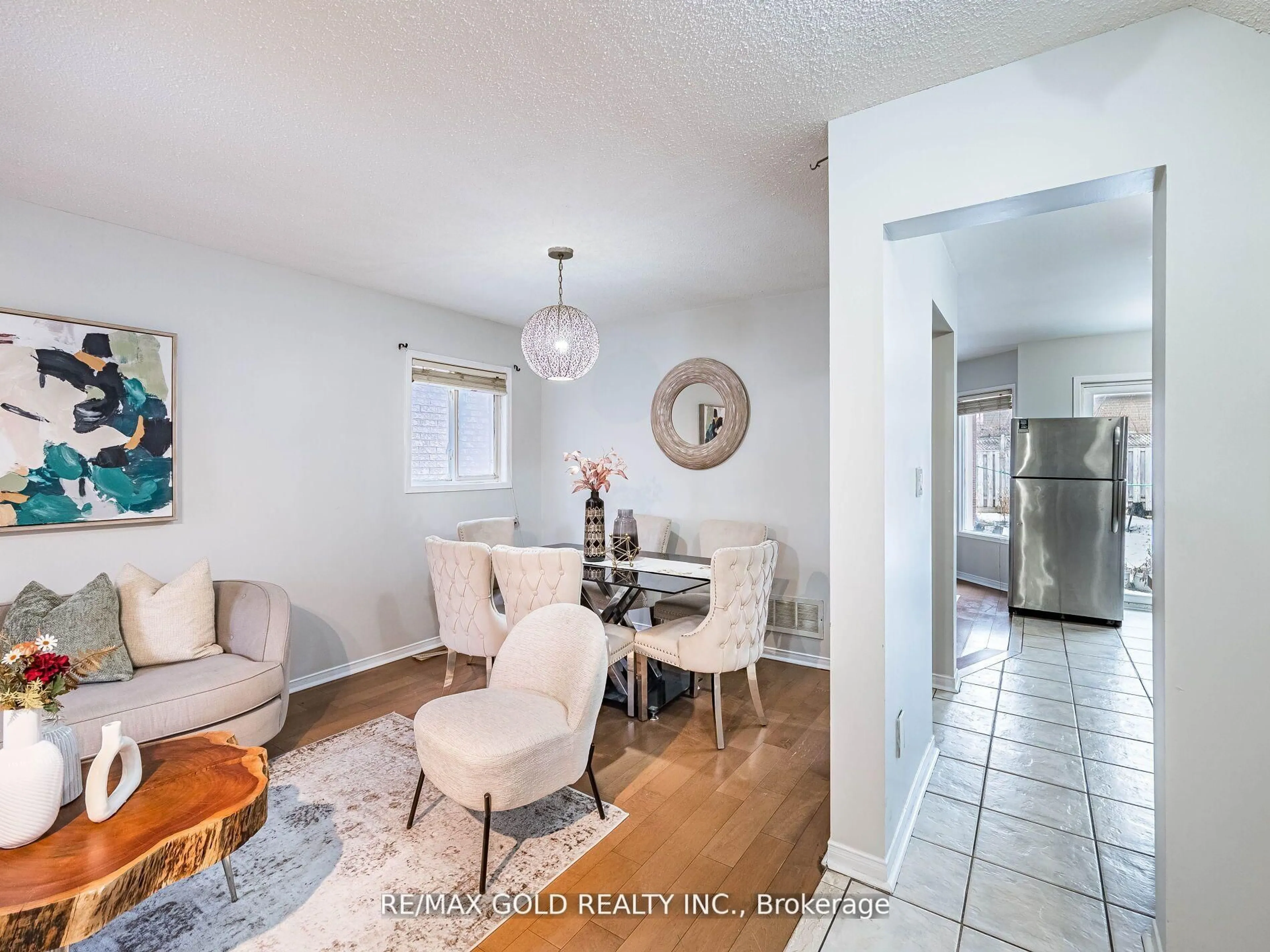 Living room with furniture, ceramic/tile floor for 33 Fiddleneck Cres, Brampton Ontario L6R 1R2